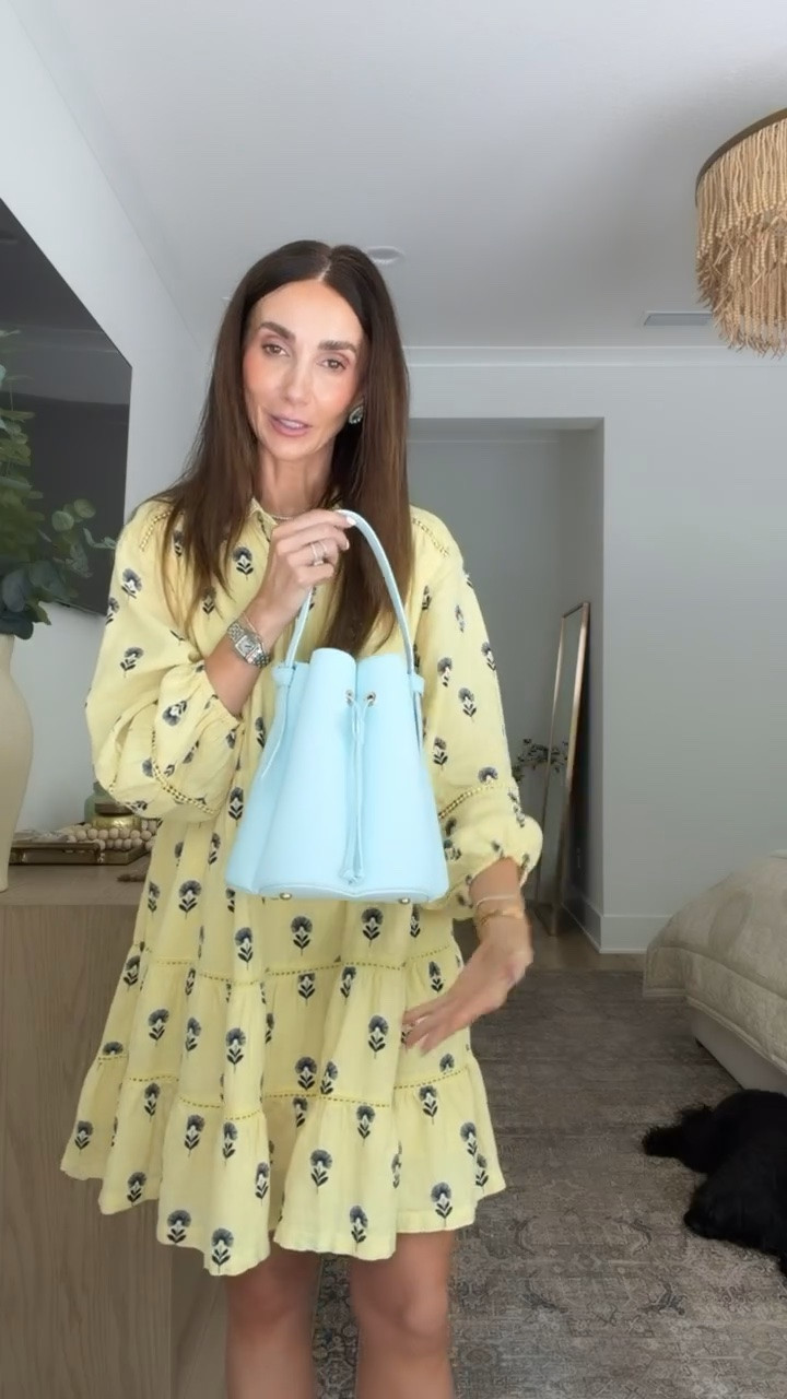 Anthropologie dress, I'm wearing size XS. Statement bucket bag and earrings.

#LTKootd #LTKOver40