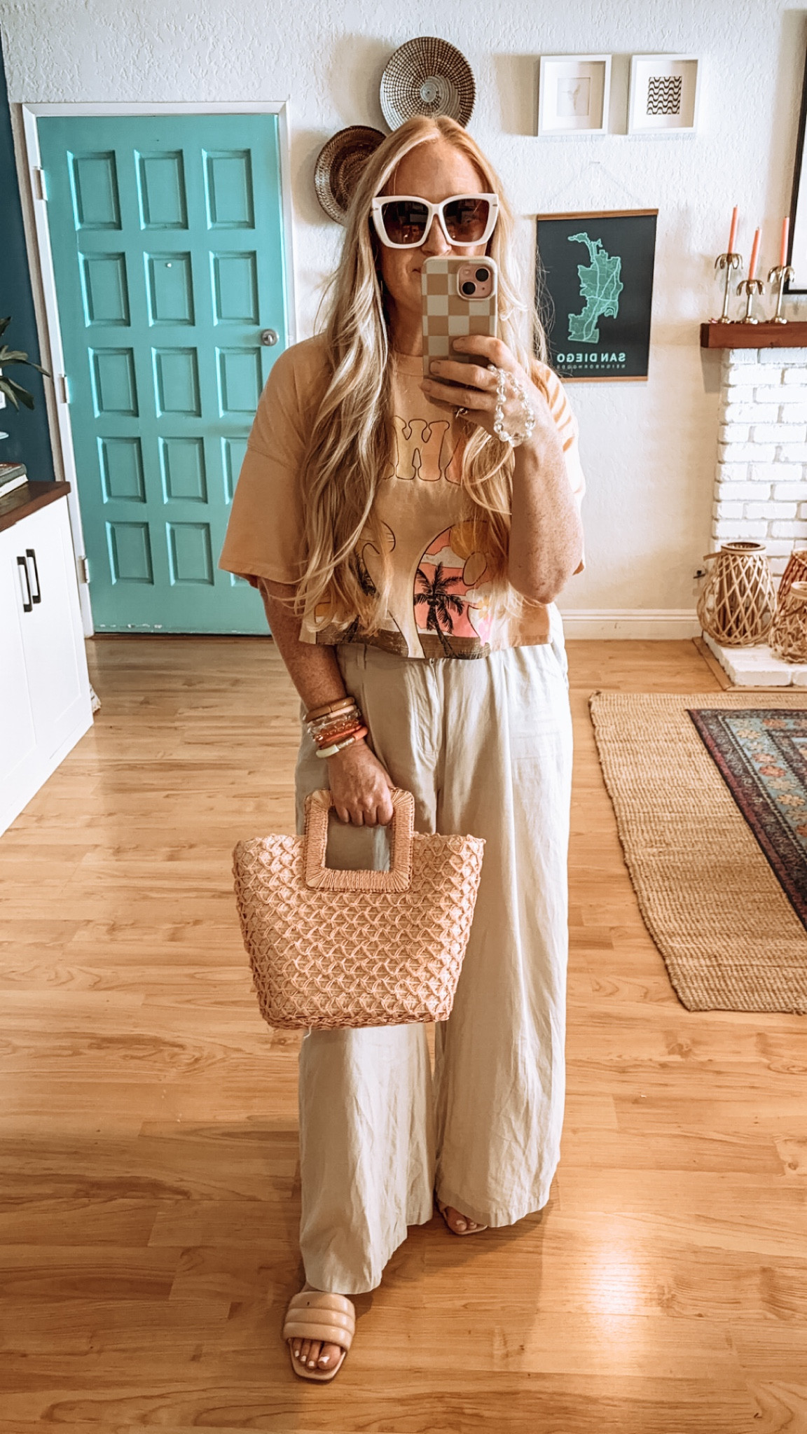 Easy summer trouser look ☀️ Pants run large, size down! Wearing medium. 

Linen trousers, trouser outfit, graphic tee, cropped graphic tee, straw handbag, summer bag, summer purse, summer slides, retro sunglasses, casual summer outfit, summer capsule wardrobe

#LTKFindsUnder50 #LTKSeasonal #LTKSummerSales