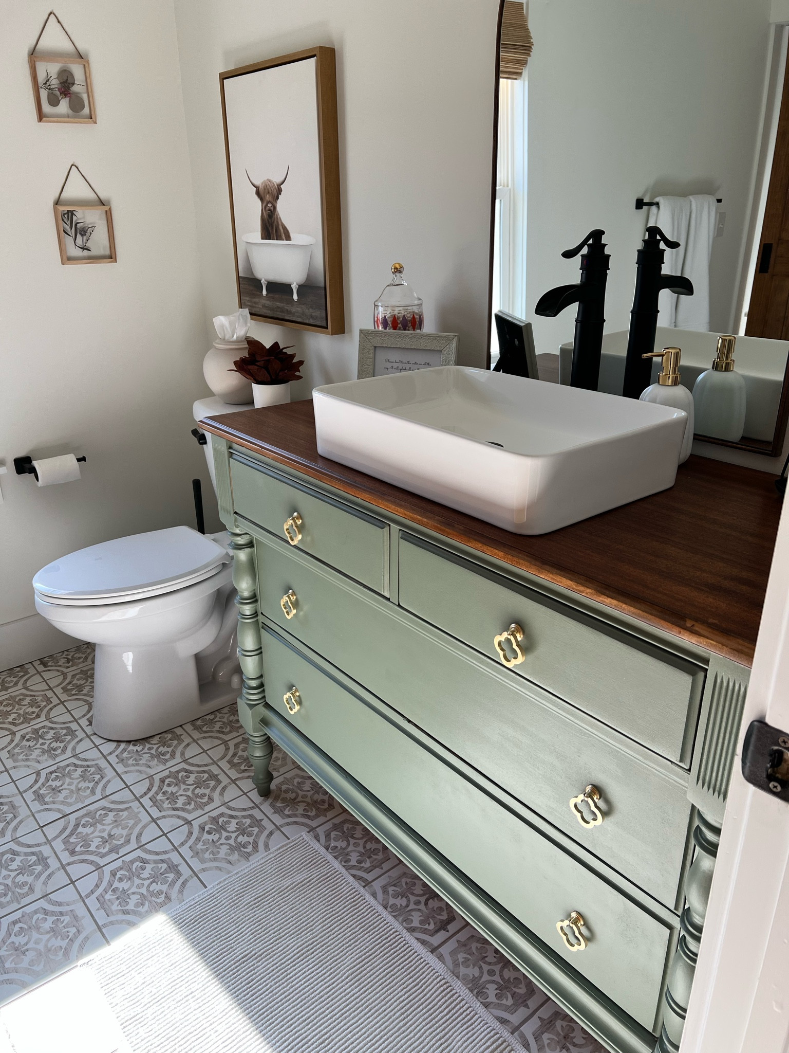 LOVE how our guest bathroom turned out in our renovation! Recycling the dresser we found on the side of the road is one of my favorite DIYs in our home #farmhouse #homerenovation #homedecor 

#LTKhome #LTKstyletip #LTKfindsunder100