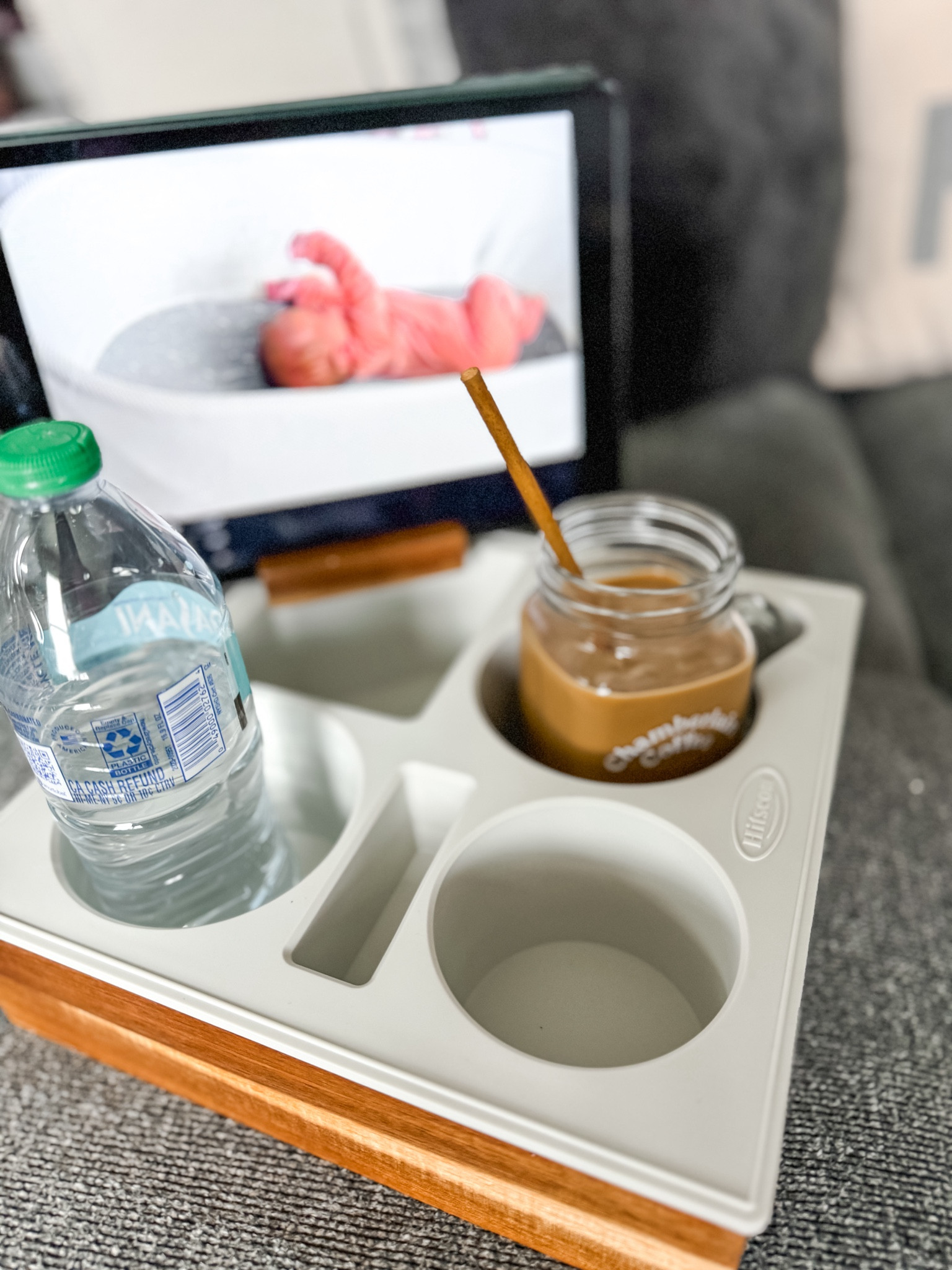 This couch drink holder is a MUST HAVE in our household! It securely holds tumblers, mugs, water bottles, snacks and has a spot to prop up an iPhone, iPad, Kindle, and more!

#LTKFindsUnder50 #LTKBaby #LTKHome