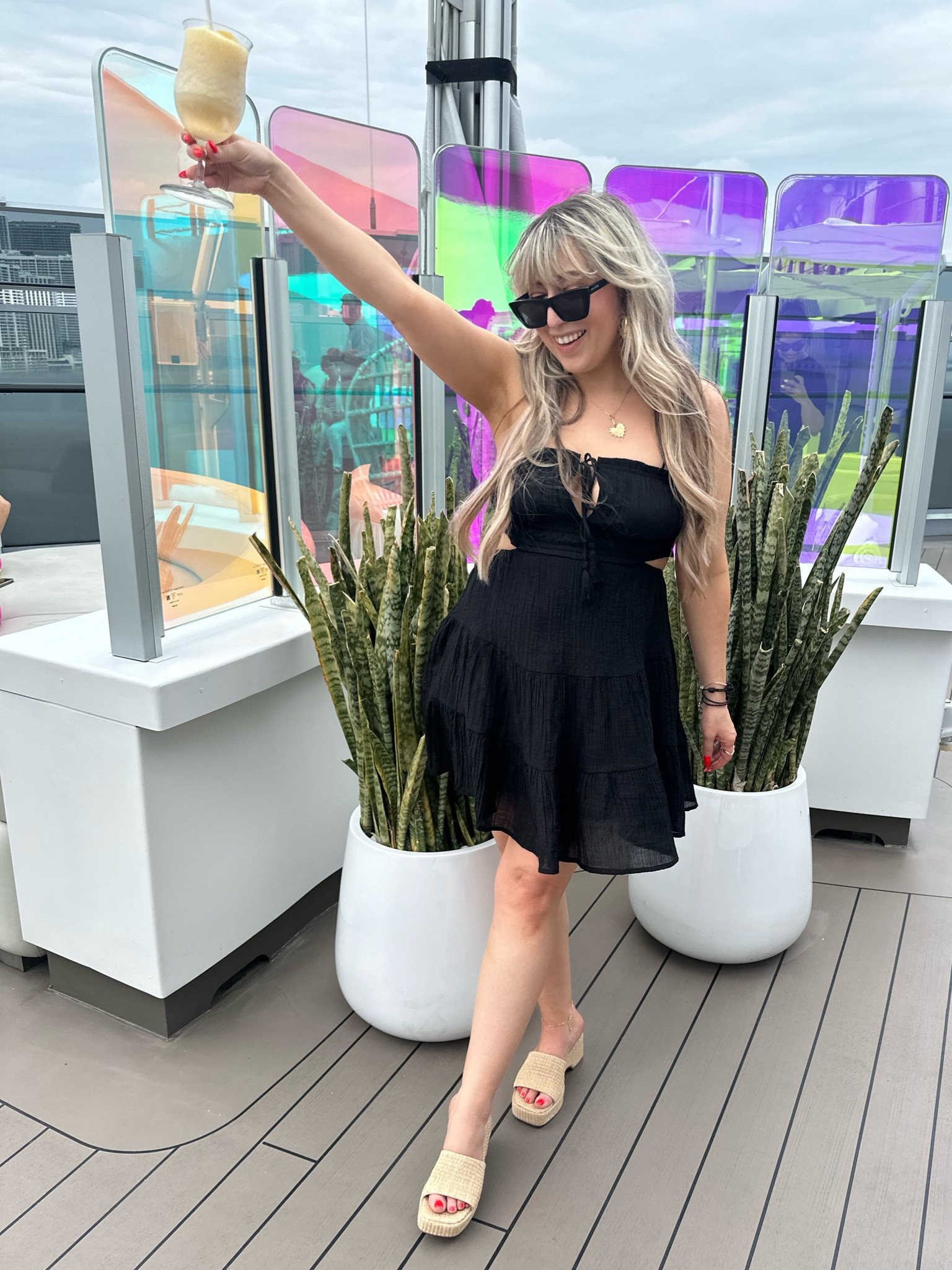 What I wore on my virgin voyages cruise - This black sundress is perfect for a summer or spring outfit! Wore this little Amazon sundress to board the cruise and got so many compliments. Super stretchy back and very forgiving, I ordered a size small. Paired with straw mules that were so comfortable and perfect for beach vacations, cruises, or spring and summer outfits. THE PERFECT STRAW SANDAL! Great quality summer sandals for sure. Wearing my true size. 

#LTKtravel #LTKSeasonal #LTKfindsunder50