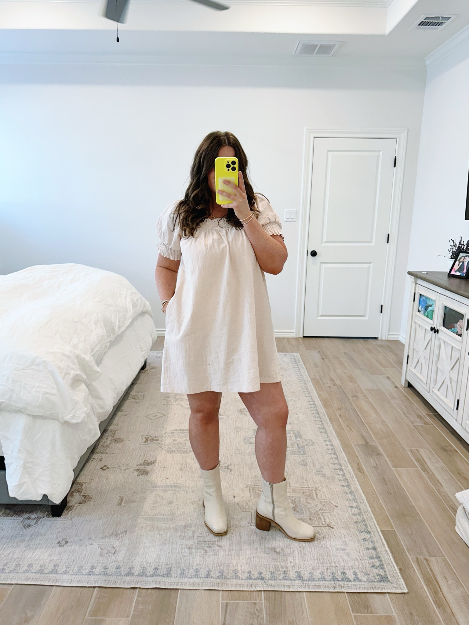 Reposting this easy throw on dress! comes in other neutrals & is perfect for transitioning to fall! 
Dress: mediumm
boots: old from free people!