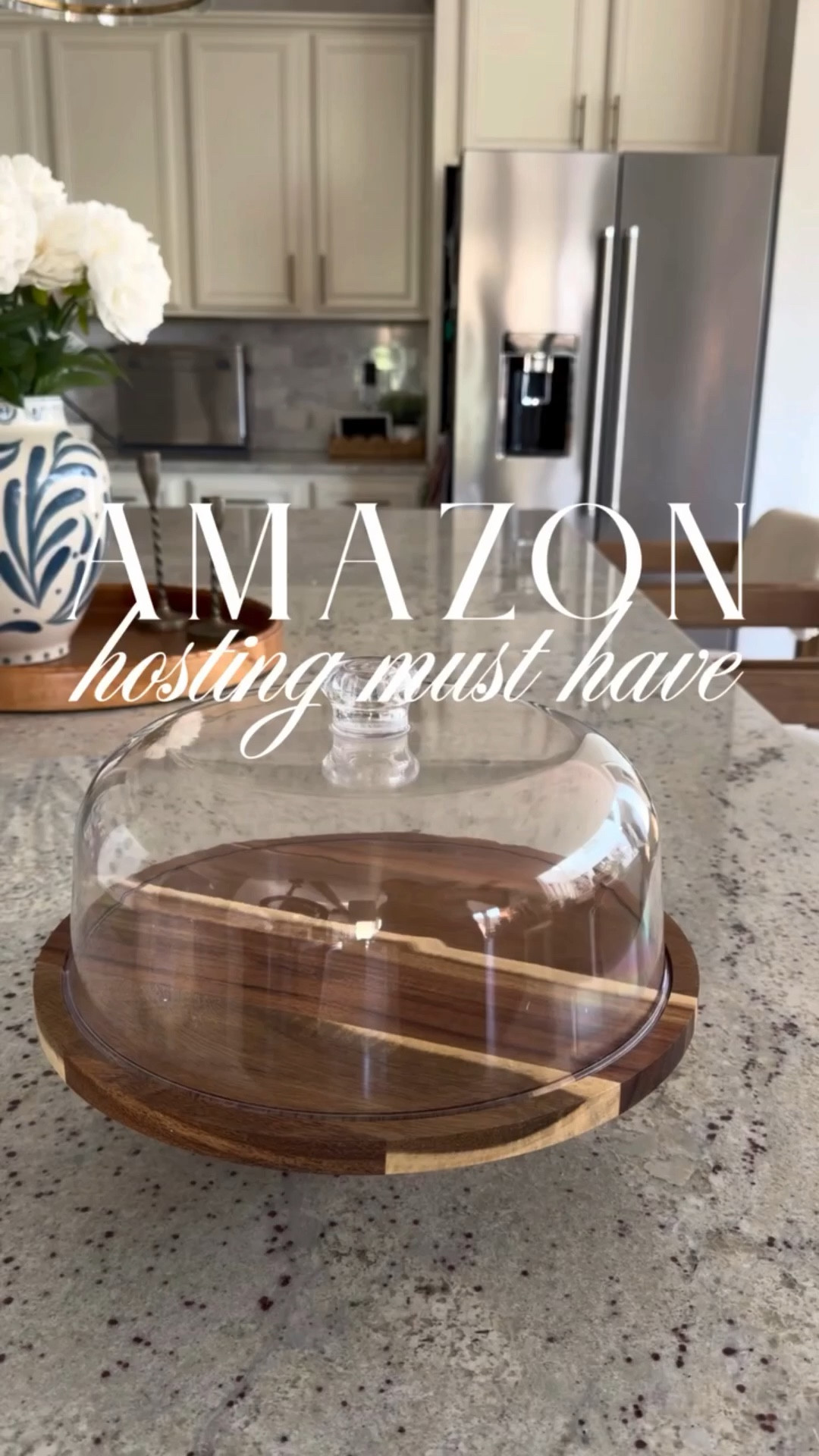 Hosting season just got easier thanks to this Amazon must-have.

This gorgeous wooden cake stand with lid is one of my favorite entertaining finds because it does so much more than hold a cake.

Flip it over and it instantly becomes a charcuterie board or chips and dip tray — which makes it perfect for hosting, holidays, parties, or even everyday snacks.

I love pieces that are beautiful, functional, and multi-use, and this one checks all the boxes.



Follow along for more affordable home and hosting finds.

#amazonhomefinds
#amazonmusthaves
#amazonkitchenfinds
#hostessmusthaves
#entertainingathome

#LTKHome