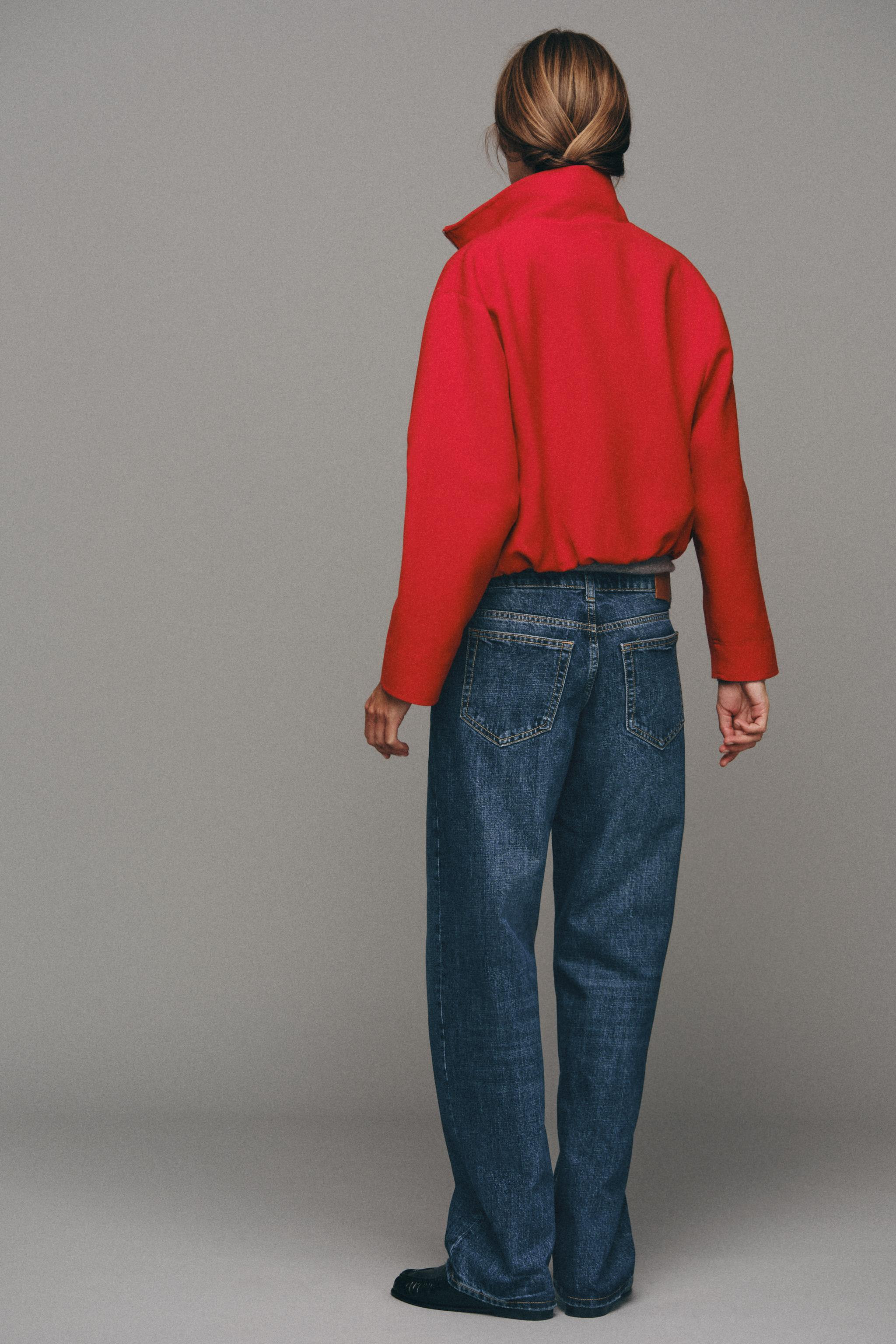 Bomber jacket with a stand-up collar and long sleeves. Side pockets hidden in the seams. Hem with... | Zara US