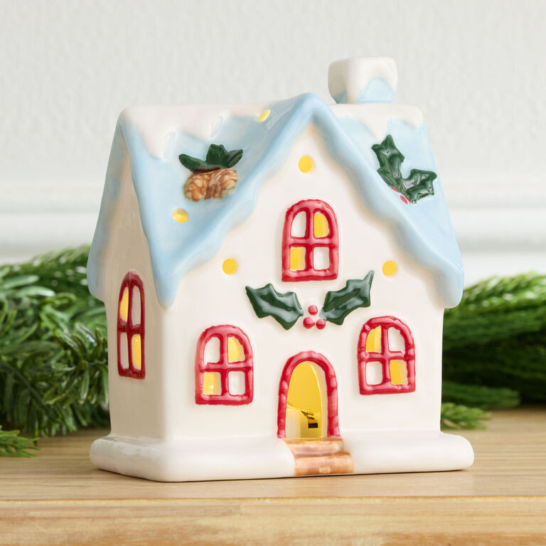 Ceramic Christmas Cottage with Blue Roof LED Light Up Decor | World Market