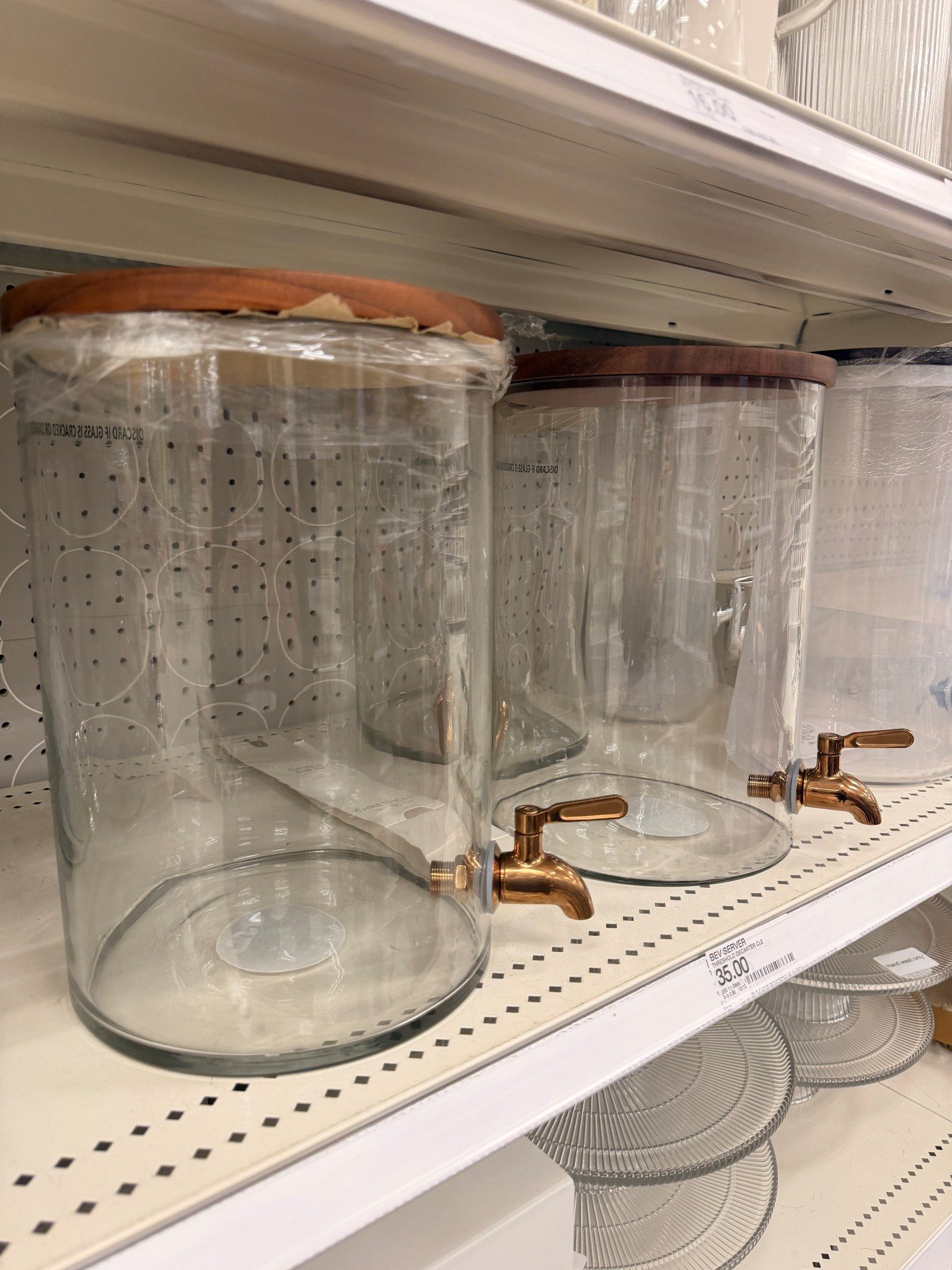 The prettiest beverage dispenser for hosting 🤍

This glass beverage dispenser is perfect for parties, gatherings, and everyday entertaining. The wood lid and gold spout give it that elevated, high-end look.

Perfect for:
• drink station setup
• party hosting essentials
• summer entertaining
• bridal showers & baby showers
• lemonade or iced tea bar
• kitchen counter styling

Such a good find for hosting season.

#LTKHome #LTKSeasonal