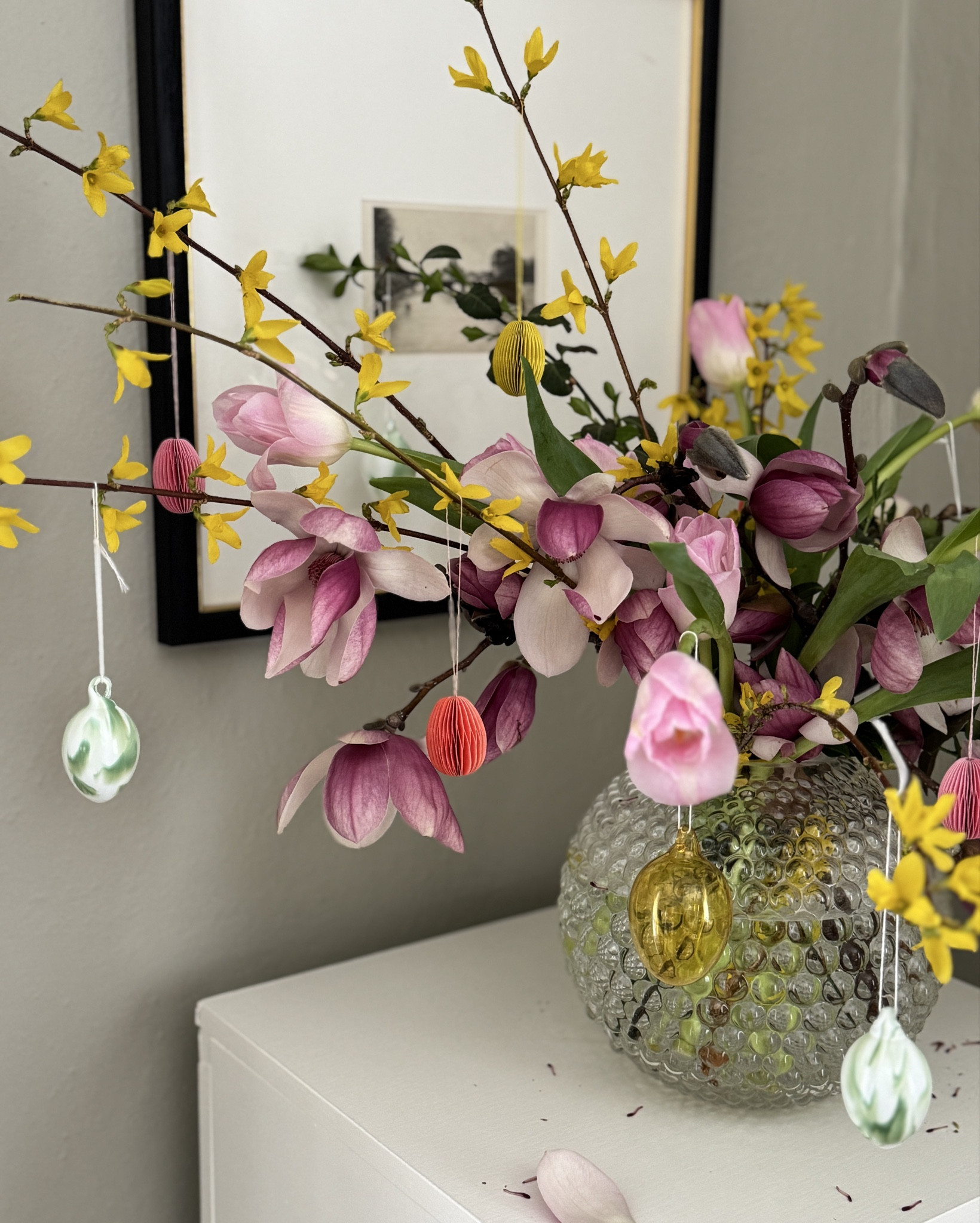 The easiest, prettiest way to incorporate a little bit of Easter into your home: gather blooming branches and hang tiny egg ornaments all over. This would be perfect for an Easter centerpiece!

#LTKStyleTip #LTKSeasonal #LTKHome