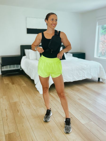 Love a good comfy and casual look. These shorts have a built-in liner so they’re great for everyday wear but also running and lifting. The sneakers are SO comfortable. I’ve had them for years and they are worth every penny!!! The tank top is also a staple in my wardrobe. I wear these tanks all year long, in summer by itself and in winter for layering. Everything is just amazing! #casualoutfit #springoutfit 

#LTKsalealert #LTKfindsunder50 #LTKstyletip