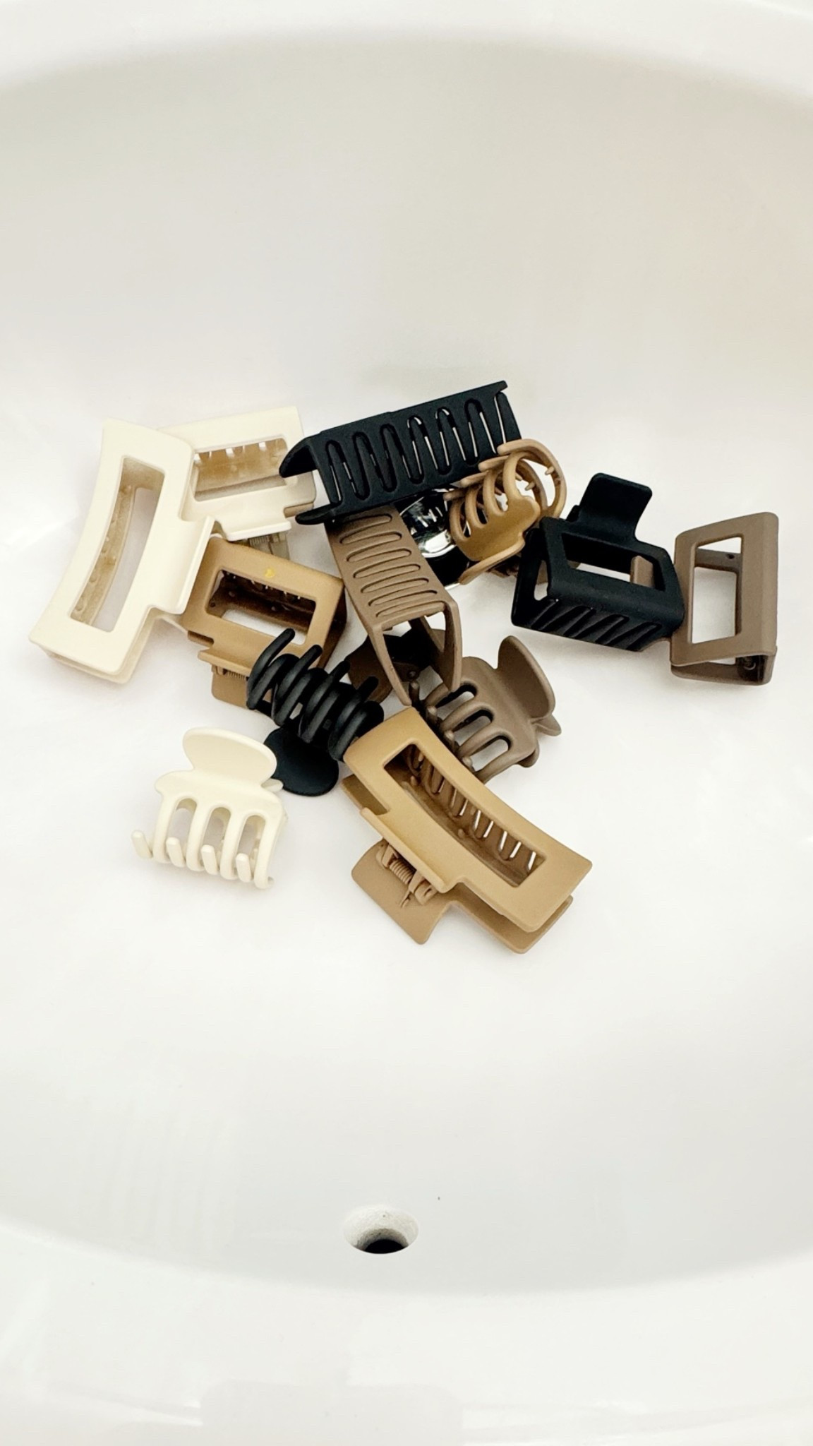 I usually buy my hair clips from the Dollar Tree but haven’t been able to find the ones I prefer. So I bought this set of claw clips and have been using them to hold steam rollers on my head, to section my hair for drying, and putting my hair on wash day.
#LTKhair

#LTKBeauty #LTKOver40