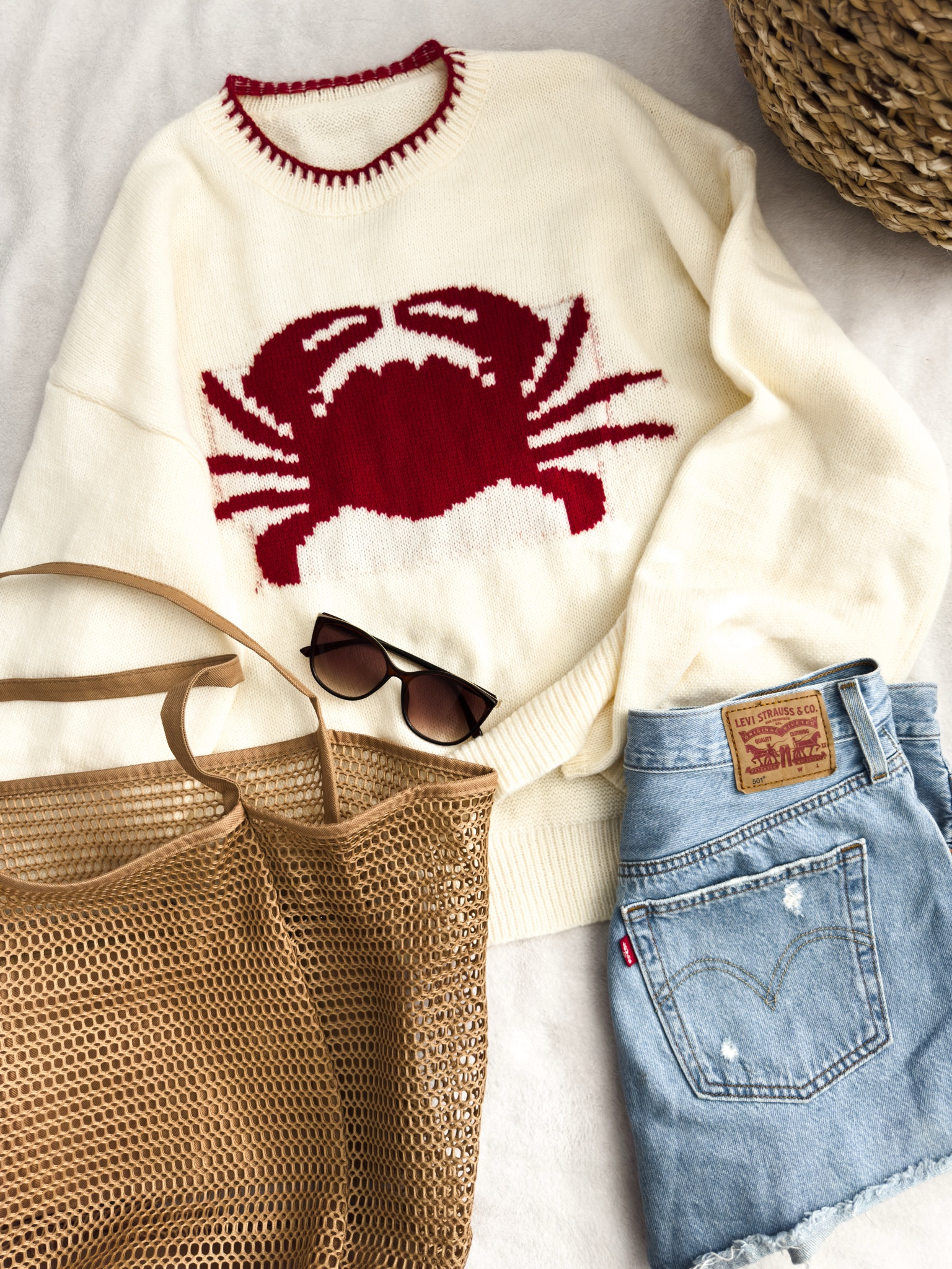 Coastal crab sweater with Levi denim shorts, and mesh tote bag






vacation outfits, tropical outfits, beach outfits, beach clothes, resort wear 2026, summer outfits, beach vacation outfit, coastal outfit, beach sweater 

#LTKPetite #LTKTravel #LTKootd