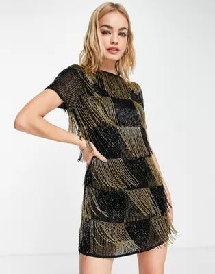 ASOS DESIGN embellished paneled shift dress with beaded fringe in black and gold | ASOS (Global)