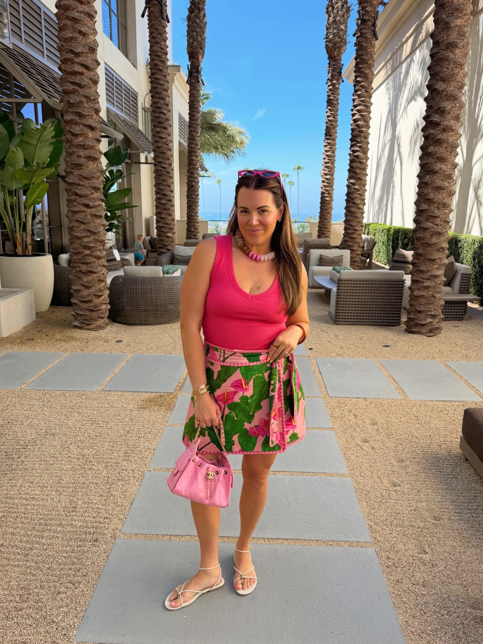 curvy midsize pink and palm vacation outfit! wearing size medium in bra tank and size large in printed skort! on sale! linking savvy’s matching outfit too 💕

#LTKSaleAlert #LTKMidsize #LTKSeasonal