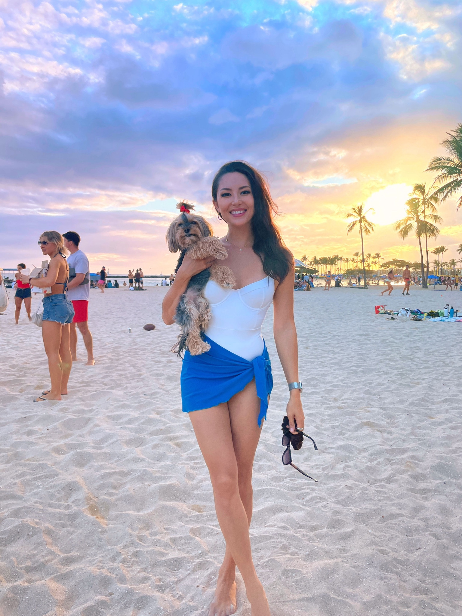 What I wore for a 4th of July beach day in Hawaii 🇺🇸🌴🌺I love both of these pieces, I have both in small. My sarong is on sale right now!! I actually cut off the belt loops on this bathing suit, so I can wear it without the belt! 

#LTKStyleTip #LTKSwim #LTKTravel