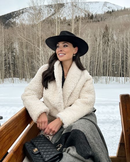 Kat Jamieson wears an Iro sherpa cream winter coat, Kemosabe hat and leather leggings in Aspen. Winter style, cozy, fedora, felt, travel, ski, snow. 

#LTKSeasonal #LTKtravel #LTKstyletip