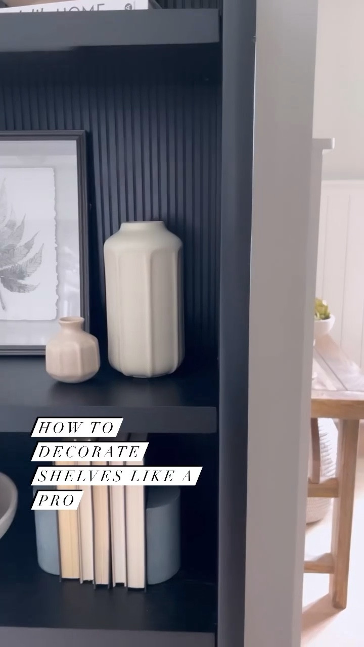 Sharing some simple tips on how to style shelves like a pro! ✨ These are the items I used to style this beautiful bookcase from Target! 

#bookcase #vase #pictureframes #wallart #decorativebowl

#LTKstyletip #LTKhome