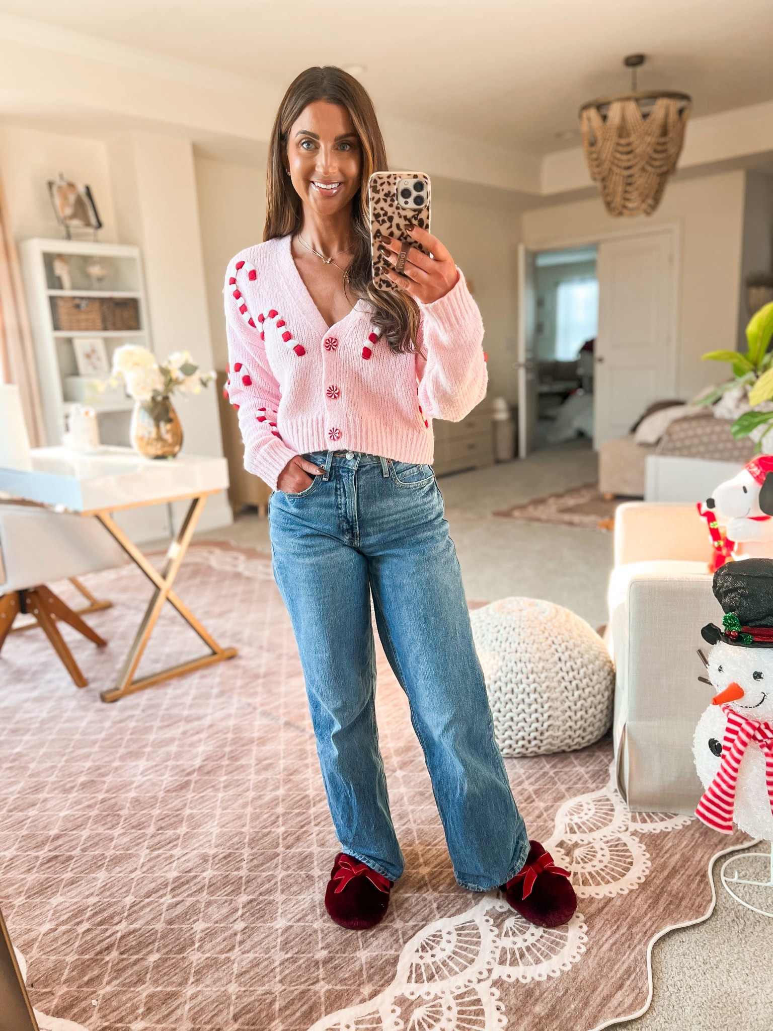 Pink cropped candy cane sweater-small
Red bow slippers 
High waisted wide leg jeans