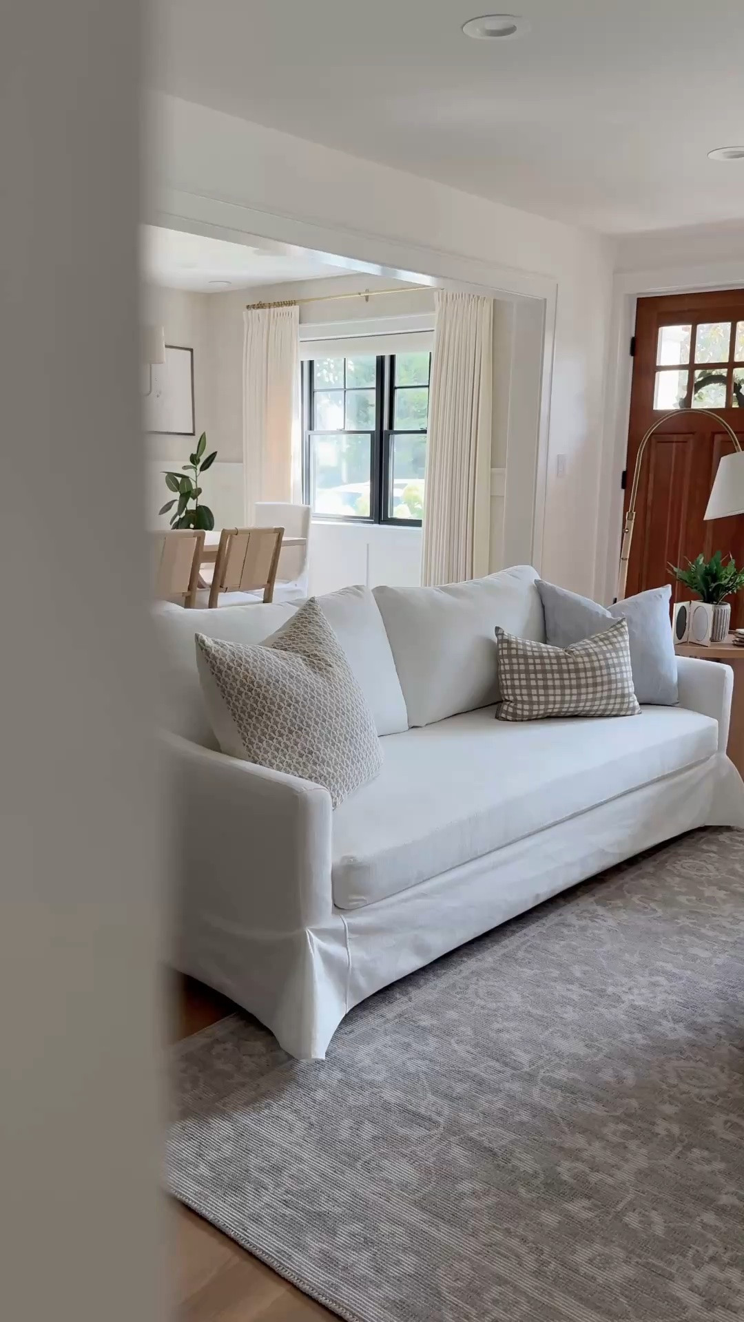 As a mom of three, I wanted a white sofa that could actually handle real life. This slipcovered sofa has been one of the a great purchase. The 100% cotton covers are removable and washable, so spills and everyday messes aren't a big deal. It has that classic, timeless look I love, but costs a fraction of similar designer options. A few of my favorite living room finds are on sale, so I'm linking everything here.