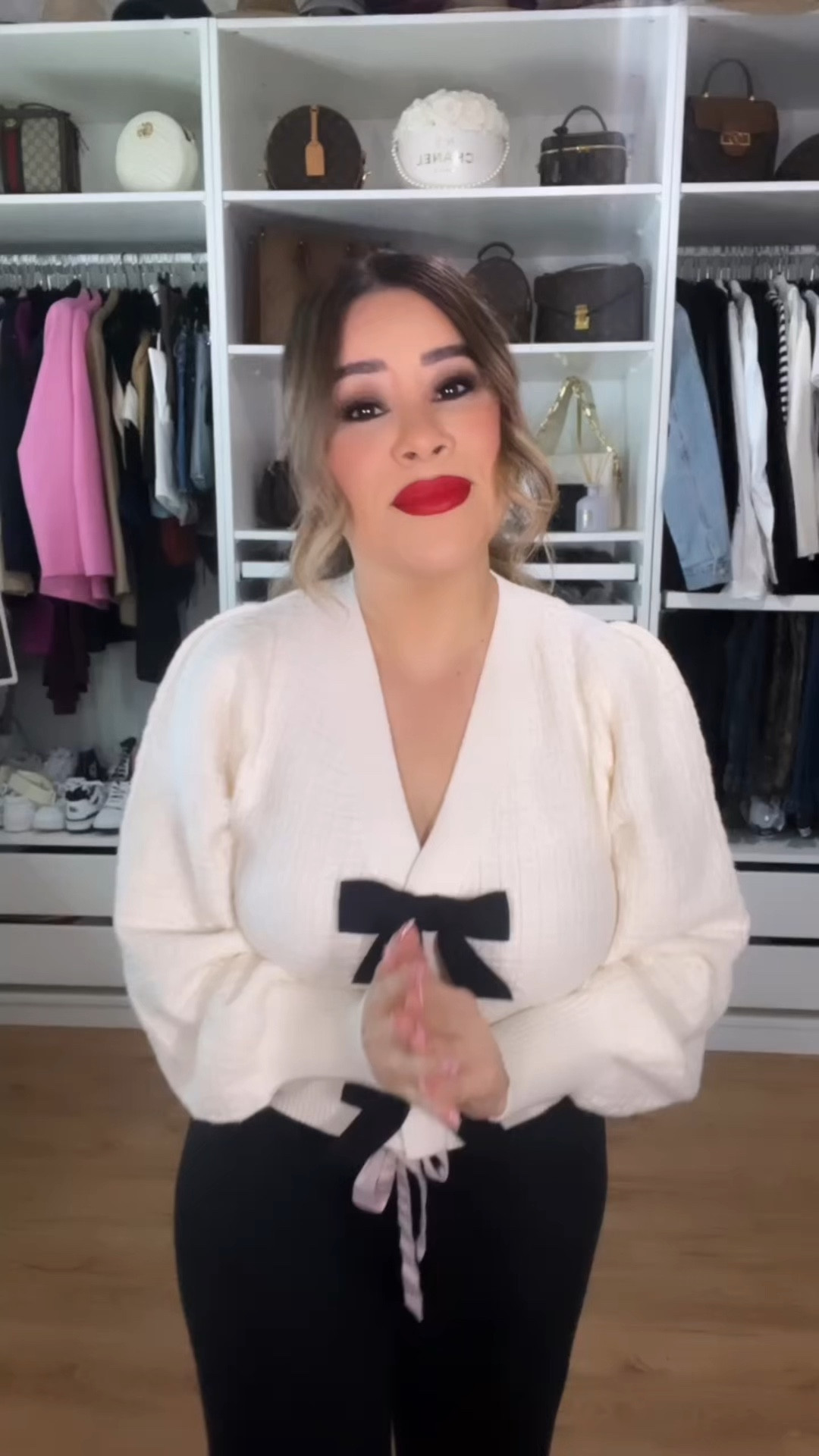 Exact sweater sold out, but they have the same one in a striped material. Wearing size small. Skirt is Zara and I am unable to link  