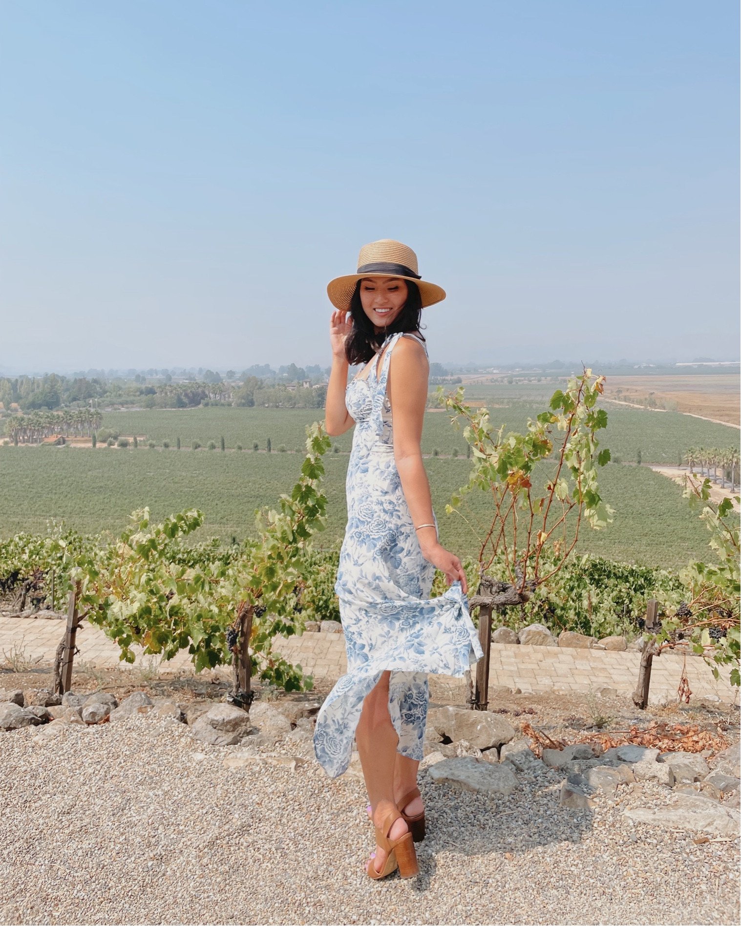 I love a blue and white dress for a spring or summer wedding, baby shower, winery, or girls brunch | Reformation Nikita Dress in Pompadour (4) | ModParty straw beach hat 

#LTKstyletip #LTKwedding #LTKSeasonal