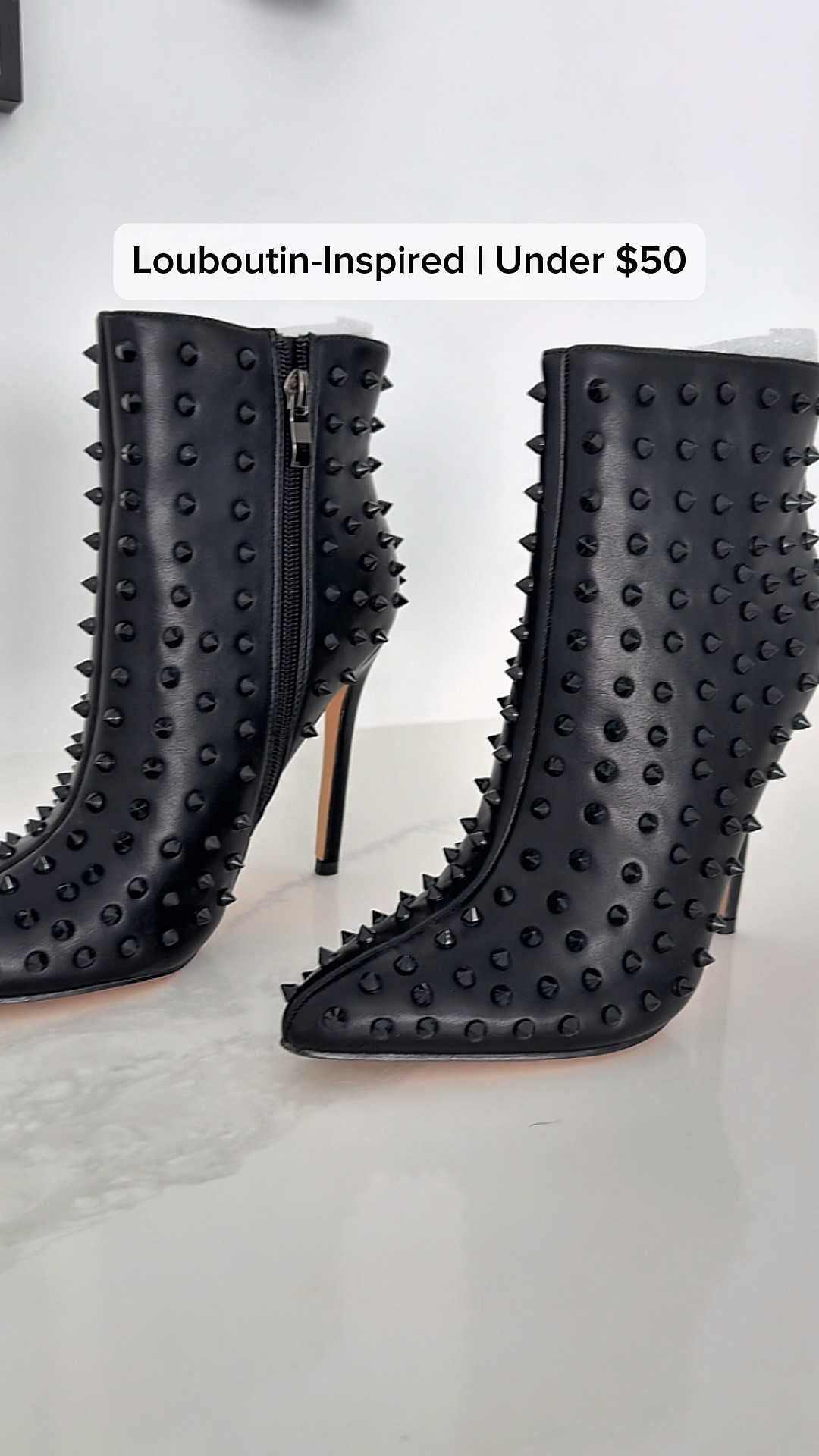 STUDDED STILETTO ANKLE BOOTS 🖤
The designer-inspired studded boots you NEED this season — at a fraction of the price!
These COLETER studded ankle booties give major Louboutin vibes without the $1,300+ price tag. Studs are THE trend for 2025/2026 (seen all over runways from Isabel Marant to Alexander McQueen) and these deliver that edgy, indie-sleaze aesthetic everyone’s loving right now.

→ Faux fur lining = actually warm for winter (most studded boots skip this!)
→ Pointed toe + sleek silhouette pairs with EVERYTHING
→ Rubber sole for anti-slip traction
→ Look expensive, feel luxe
SIZING TIP: I’m a 7.5 and sized up to an 8 for extra room with thick socks in winter — no regrets. Reviews mention they can run small, so size up a half!
3 WAYS I’M STYLING:
	1.	Wide-leg trousers + blazer for date night
	2.	Midi skirt + leather jacket for that boho-grunge edge
	3.	Skinny jeans + oversized sweater for everyday chic
4.0 stars | 163 reviews | Multiple colors available
#StuddedBoots #AnkleBoots #LouboutinDupe #WinterBoots #DesignerDupe #EdgyStyle #IndieSleeaze #FallBoots #AffordableFashion #StyleTips #WinterFashion

#LTKSeasonal #LTKOver40 #LTKootd