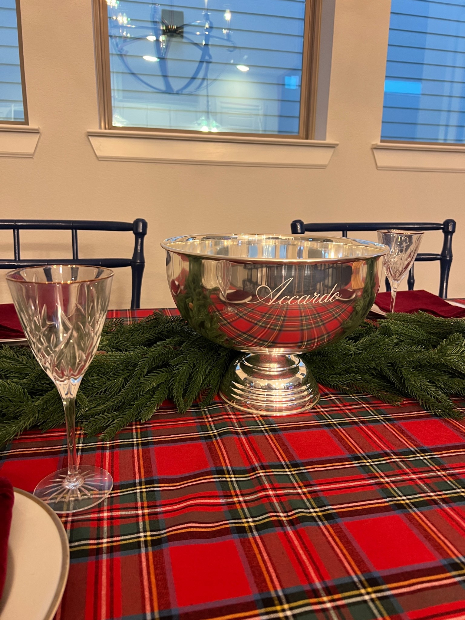 Create a Christmas tablescape that feels warm, classic, and completely unforgettable. This setup features a rich tartan tablecloth, lush evergreen garland, and a polished silver bowl centerpiece — perfect for filling with ornaments, greenery, ice for champagne, or holiday treats. Paired with crystal stemware, it’s an elegant, ready-to-style foundation for your holiday hosting. I bought the medium size silver bowl and you can add a personalization. Now just need to get an arrangement in place ! 

#LTKHoliday #LTKSeasonal