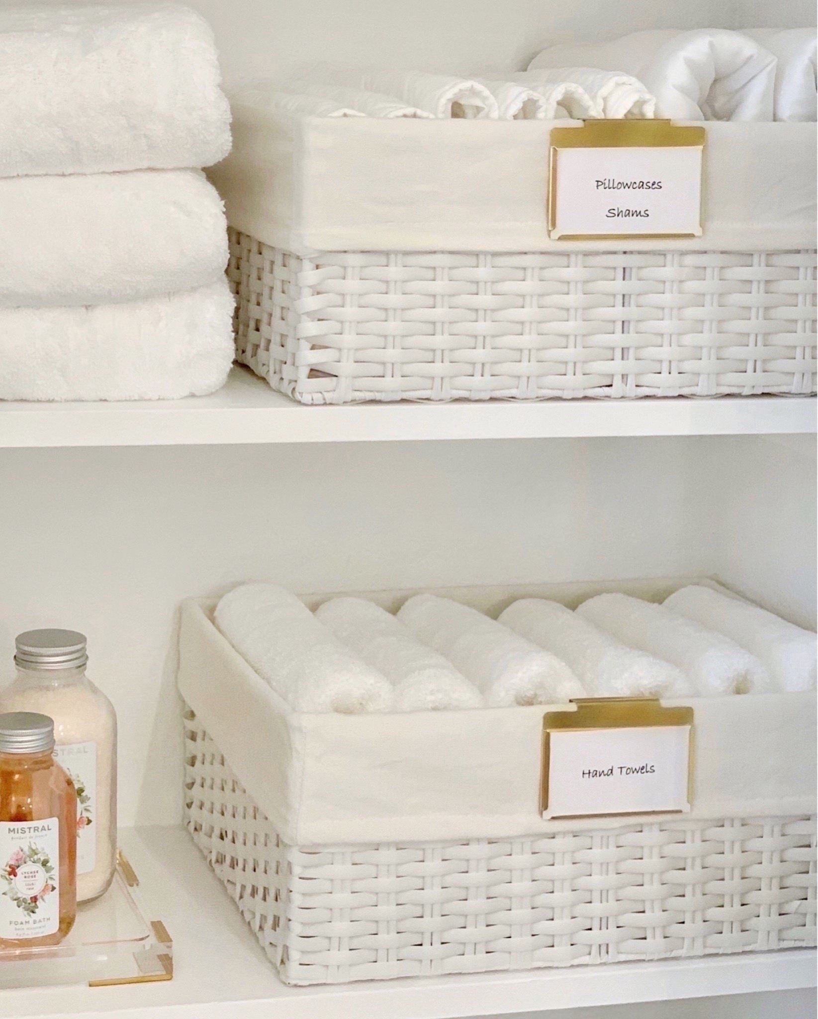 Linen closet organization white bins storage solutions towel storage