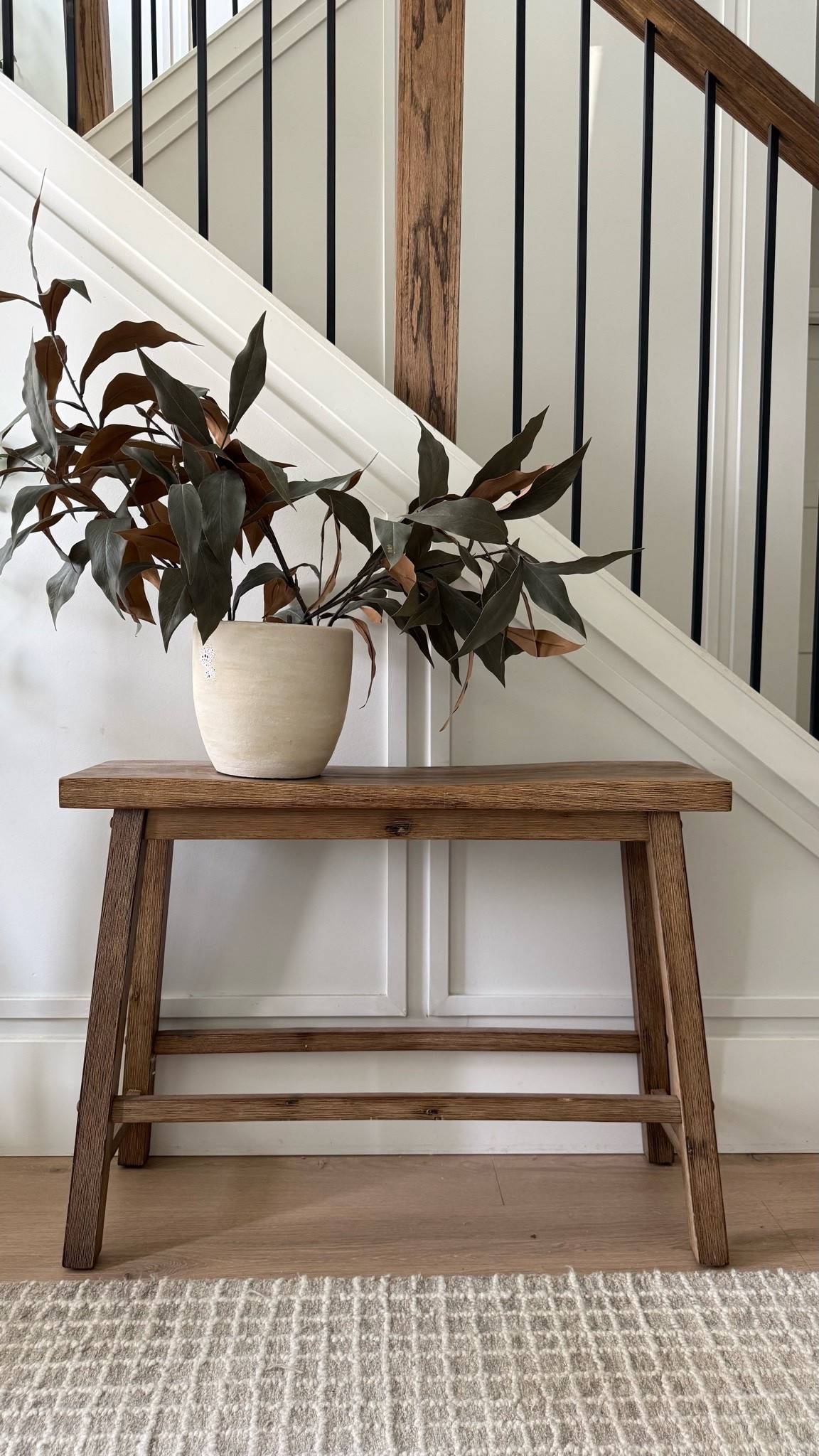 Simple entry look..this wood bench is a favorite (and so versatile) piece of mine!