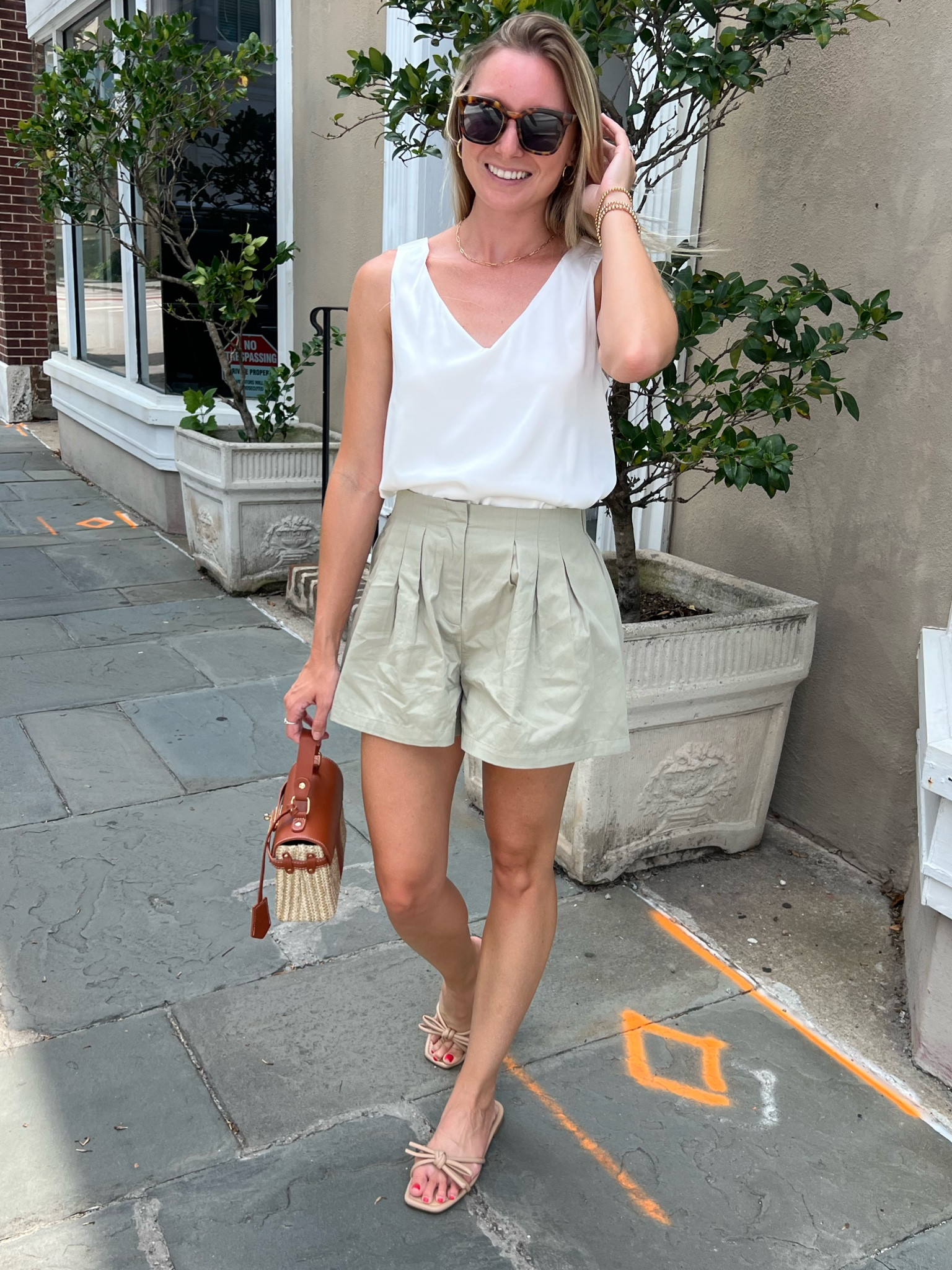A fun way to transition to fall colors - loving these green pleated shorts and silk tank 

#LTKFind #LTKstyletip #LTKunder50
