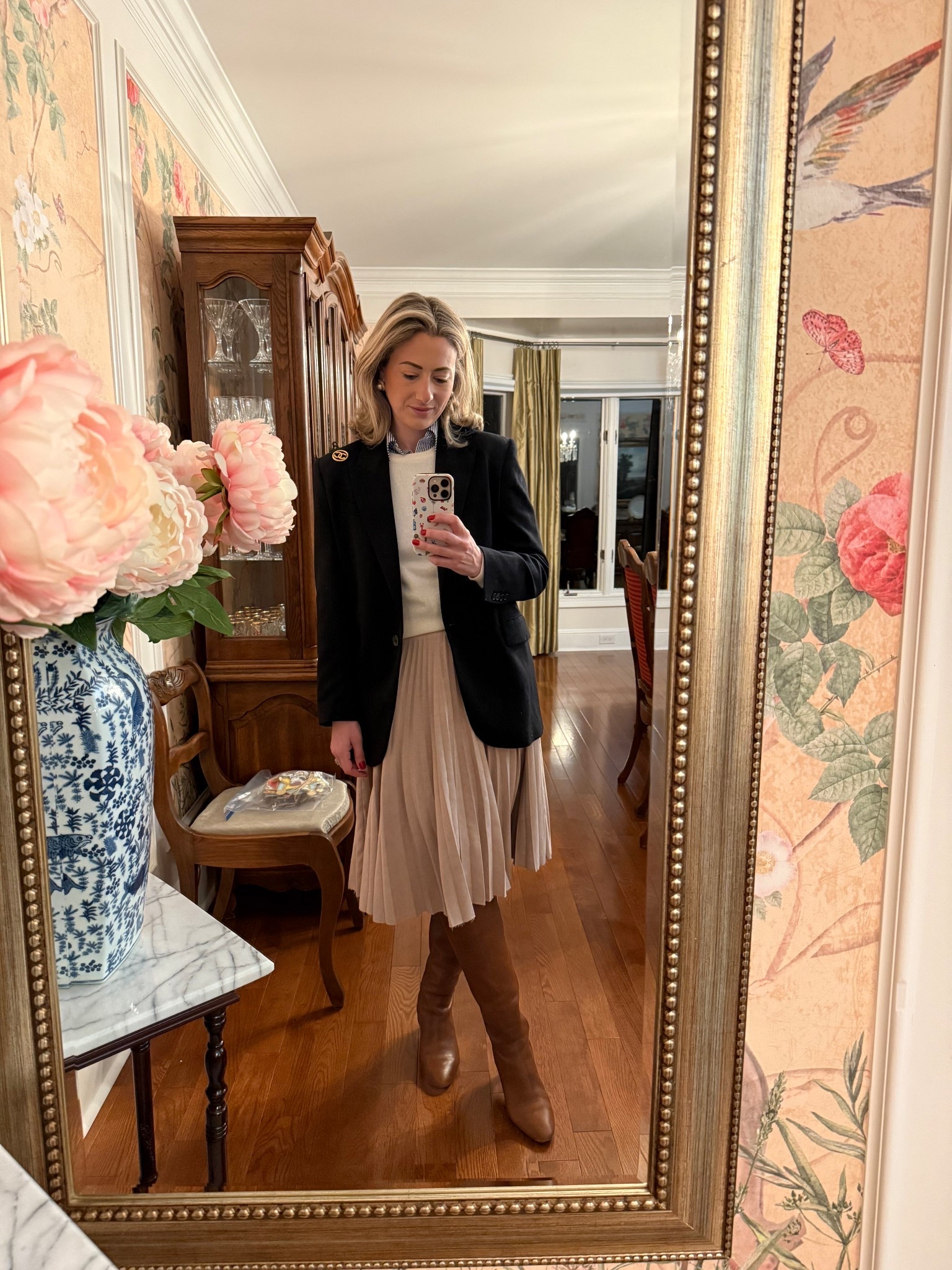 Classic tailoring with an everyday elegance 🤍
Today’s outfit is built around timeless staples. A navy pinstripe blazer layered over a white cashmere sweater and a blue-and-white striped button-down, paired with a knee-length pleated skirt and rich cognac leather boots. Structured yet approachable, this is the kind of look that feels polished without trying too hard and works season after season.

✨ Everything is linked here classic pieces you’ll wear on repeat.

#LTKWorkwear #LTKgrwm #LTKootd