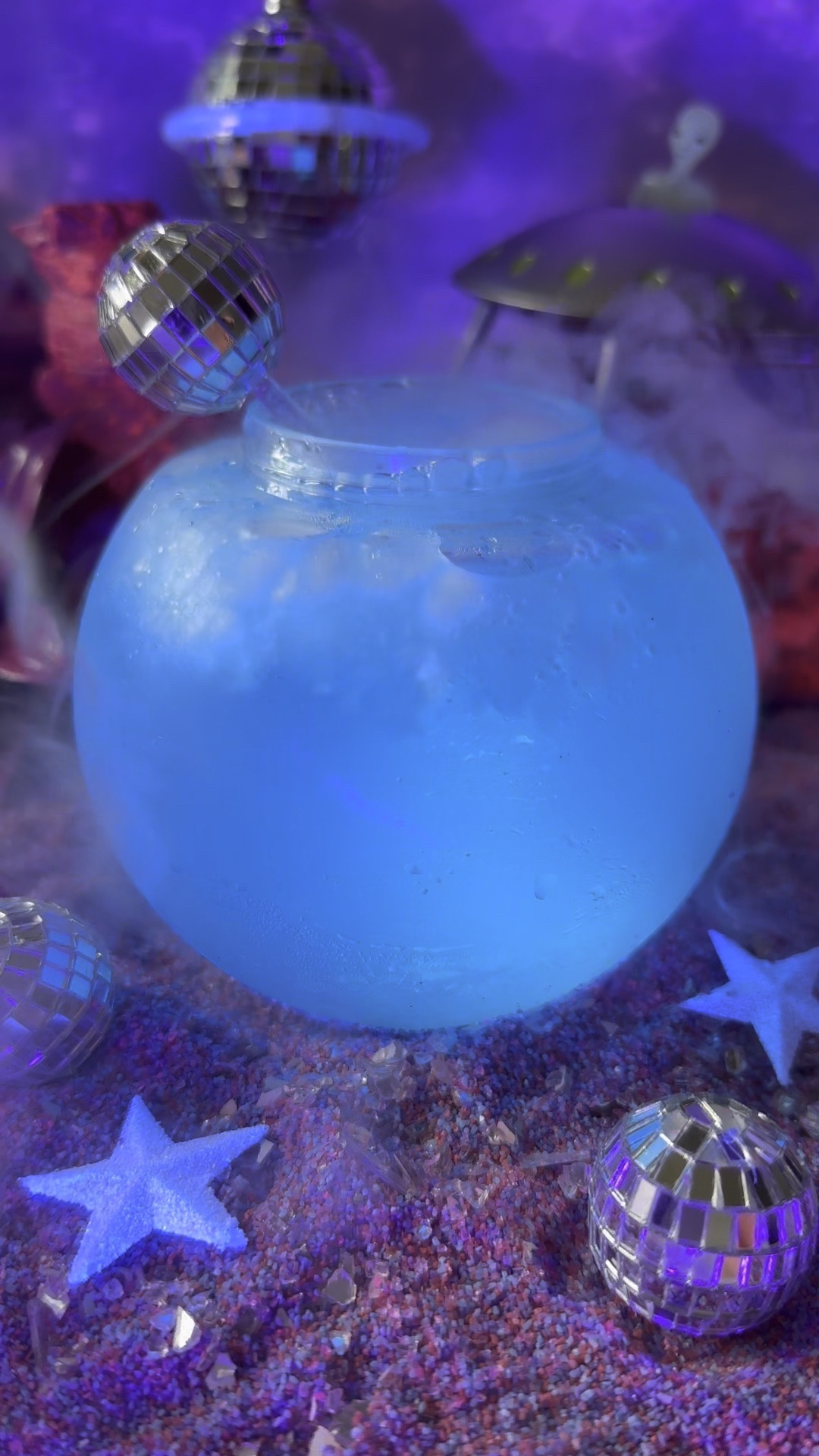A galaxy inspired cocktail that glows under blacklight!

#LTKFind #LTKSeasonal