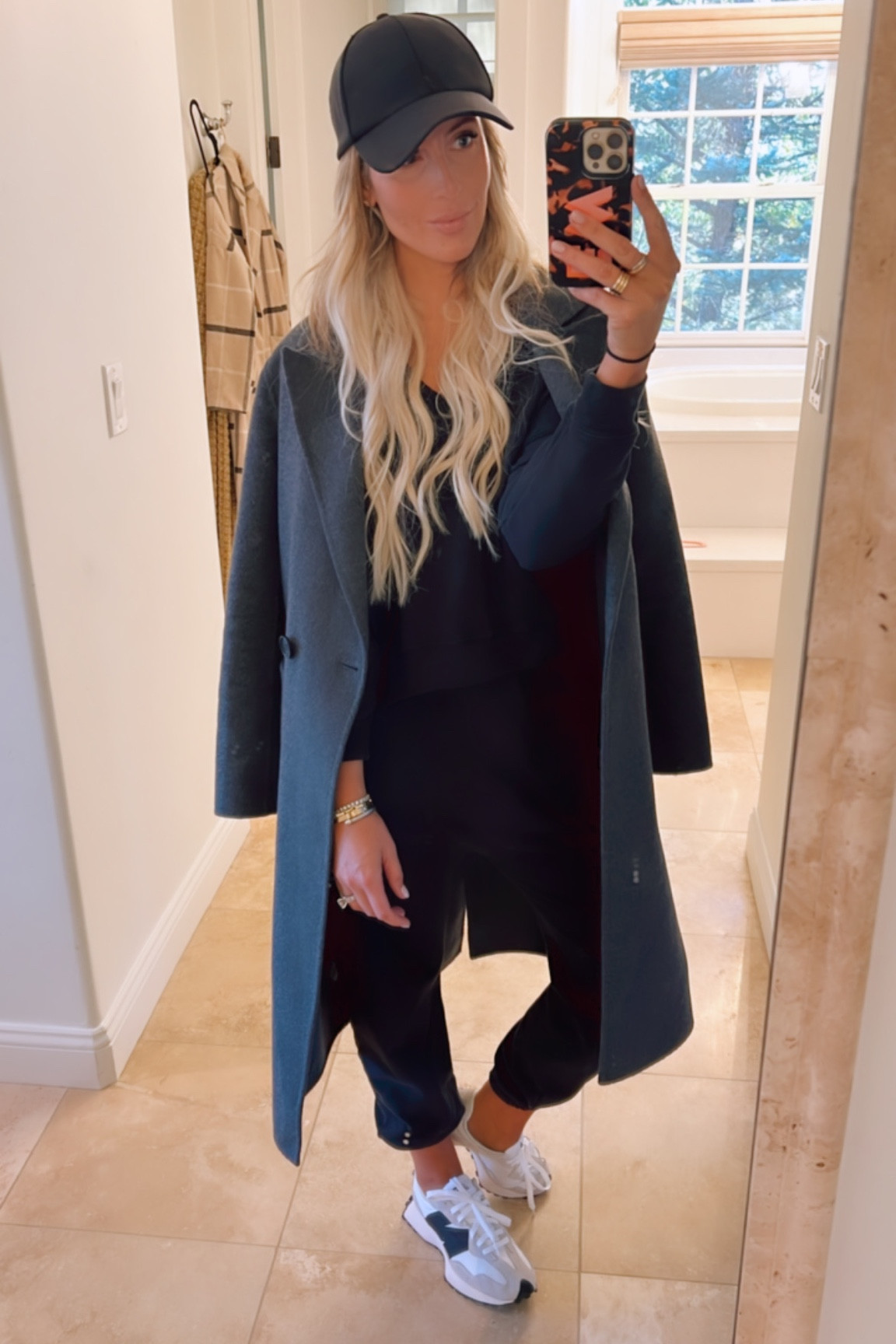 Drop off ootd. New balance, jogger sweats and a grey coat. Black baseball hat tops it off! 

#LTKunder100 #LTKshoecrush #LTKstyletip