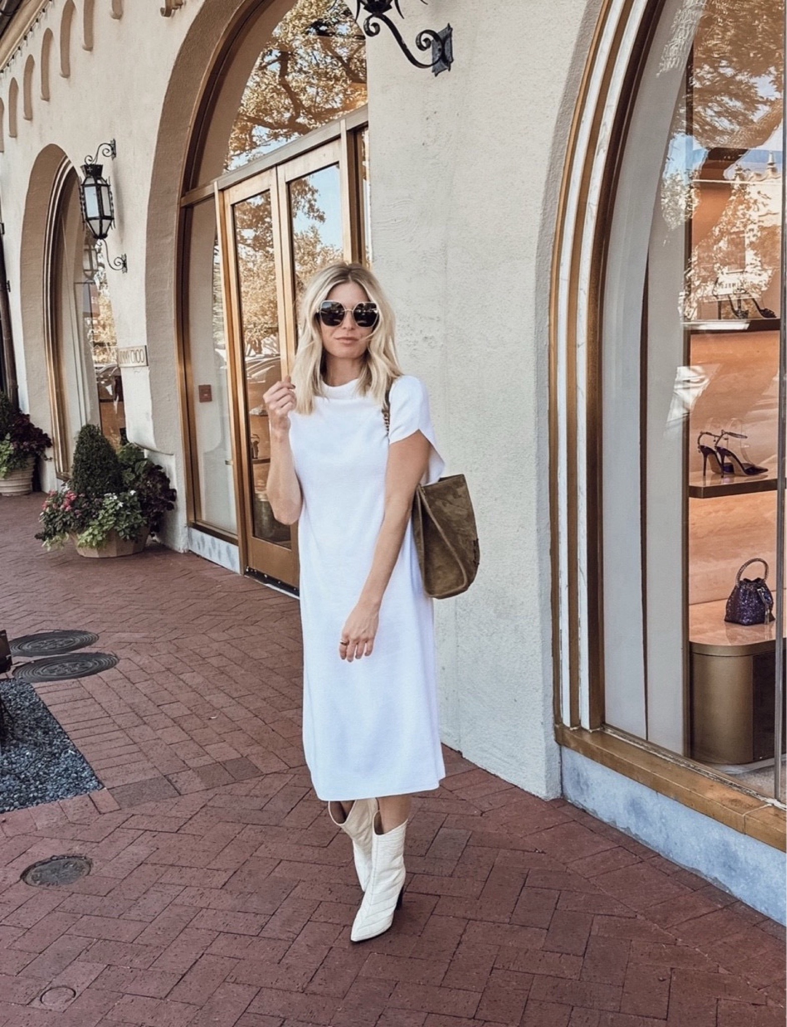 Spring workwear look 🤍 white sweater dress, suede booties, saint laurent purse and Amazon sunglasses 

#LTKSeasonal #LTKstyletip #LTKworkwear