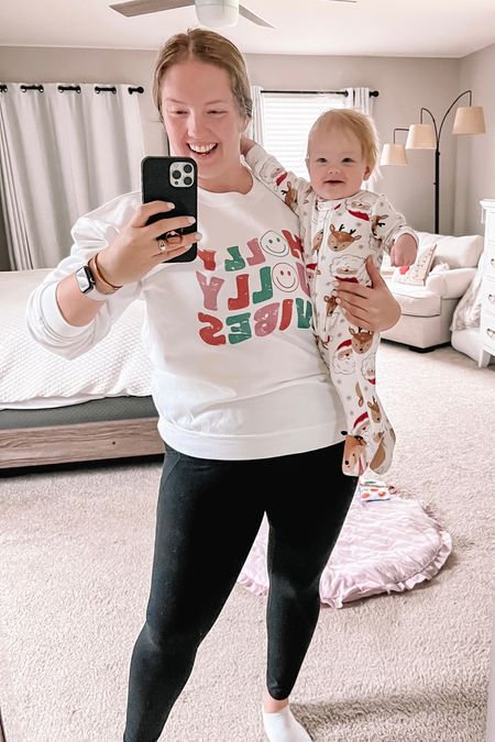 Just a couple of Holly Jolly cuties 🥰🎄 Baby Santa and reindeer sleeper is a must for the holiday season! My Holly Jolly vibes shirt is currently marked down and there’s a bunch of cute Christmas prints on sale with it! Wearing size large tts. 

#LTKSeasonal #LTKsalealert #LTKHoliday