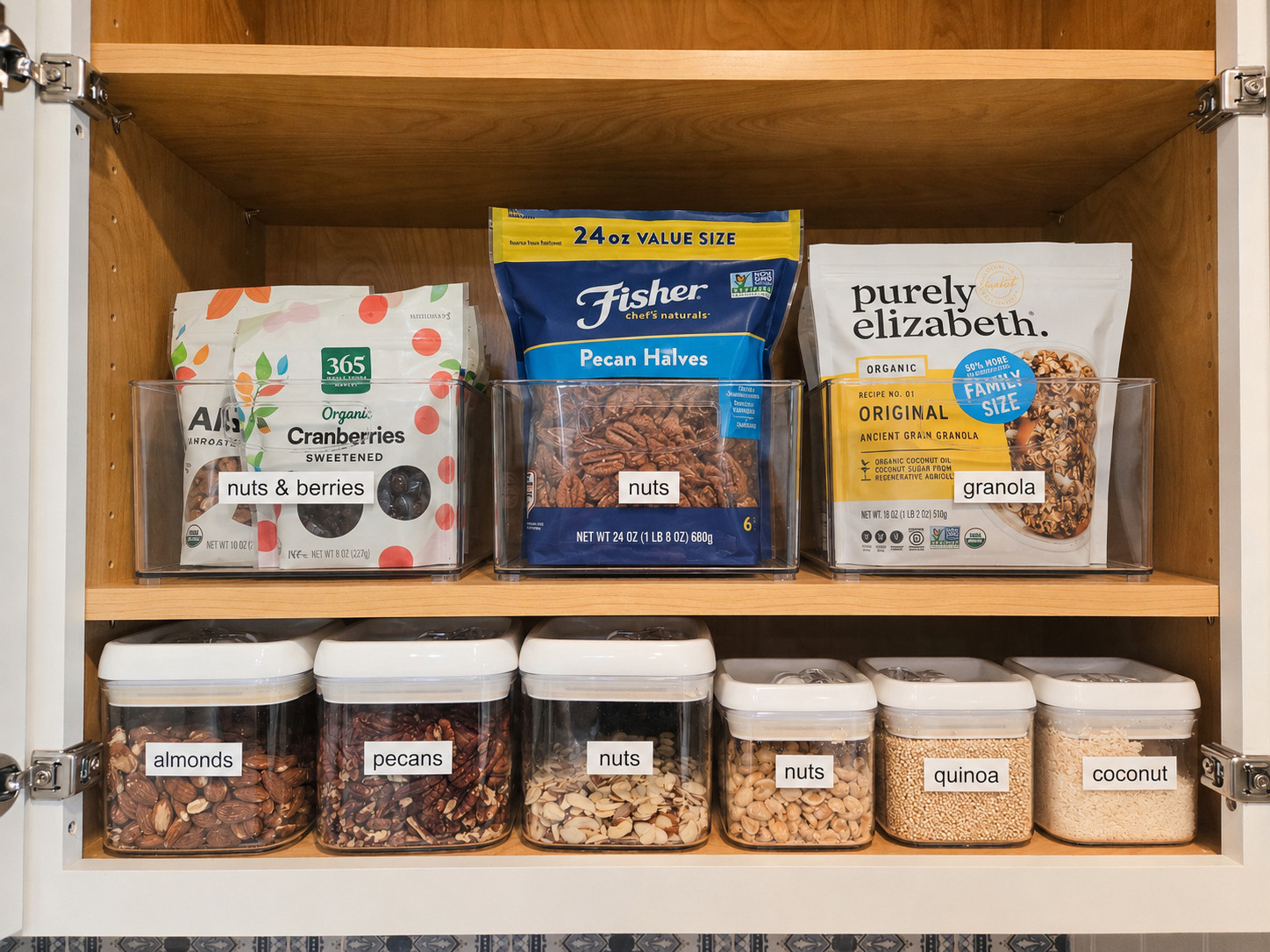 
Nothing makes us happier than clear containers and symmetry. Sometimes people wonder why the fuss about canisters and bins, but without them, this cabinet would be a hot hot mess! 

 