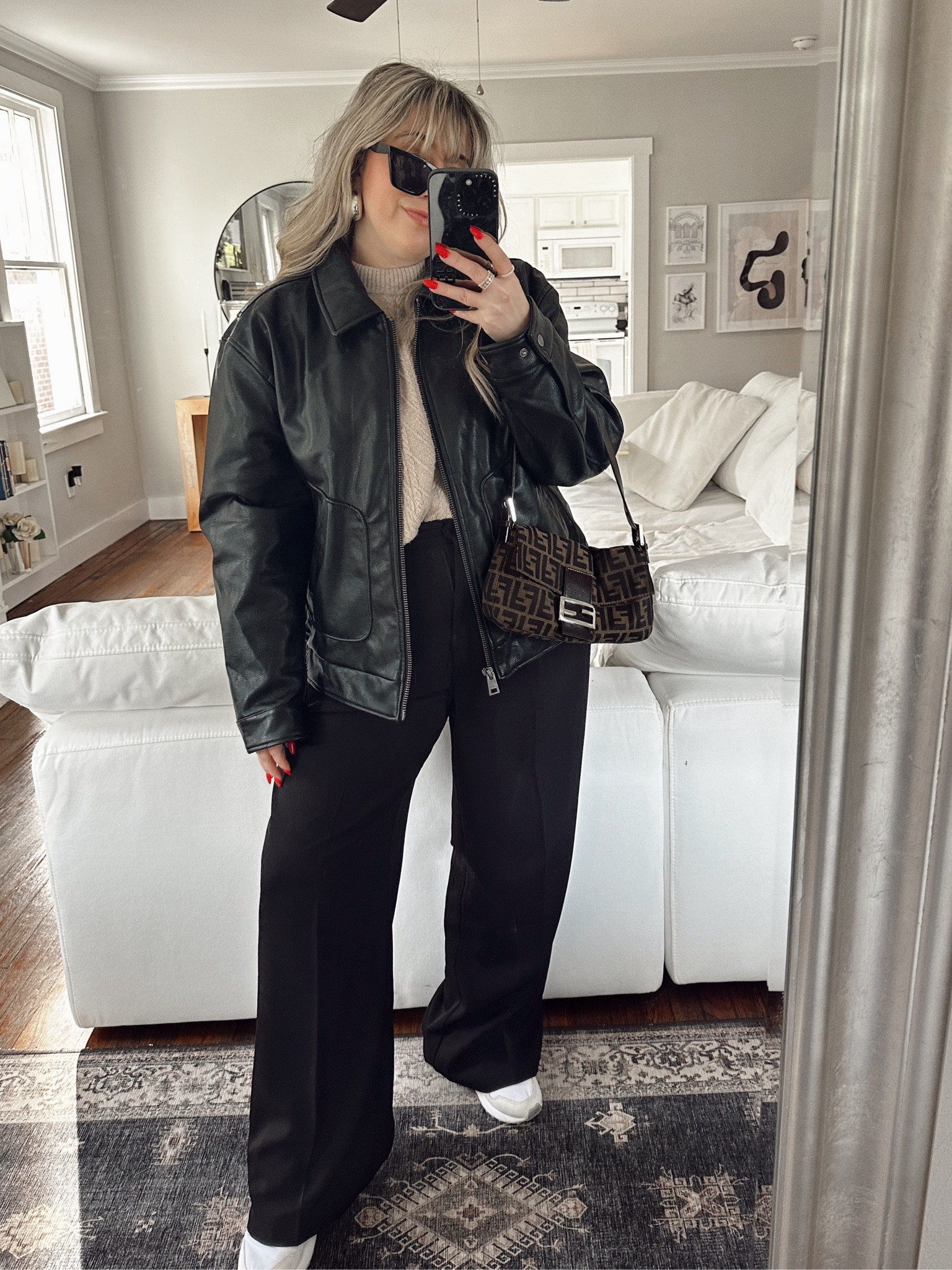 Classic winter outfit - leather bomber, soft cozy sweater, wide leg trousers and white sneakers 

#LTKstyletip #LTKSeasonal