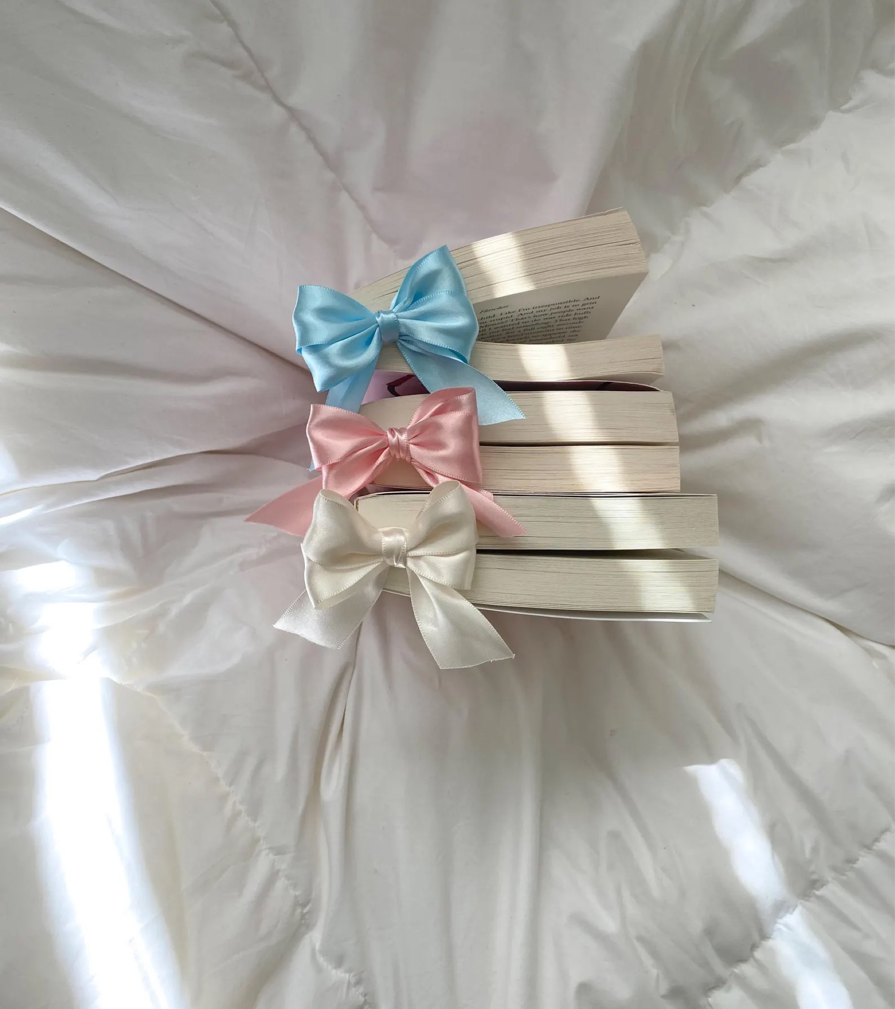 BOW bookmarks! 💕
This has to be the most fun bookmarks I have ever seen and make such a great gift for Christmas too! They are only $8 and so elegant. Definitely the cutest stocking stuffer too. I am obsessed with these bows that come in several colors. 

#LTKFindsUnder50 #LTKHoliday #LTKGiftGuide