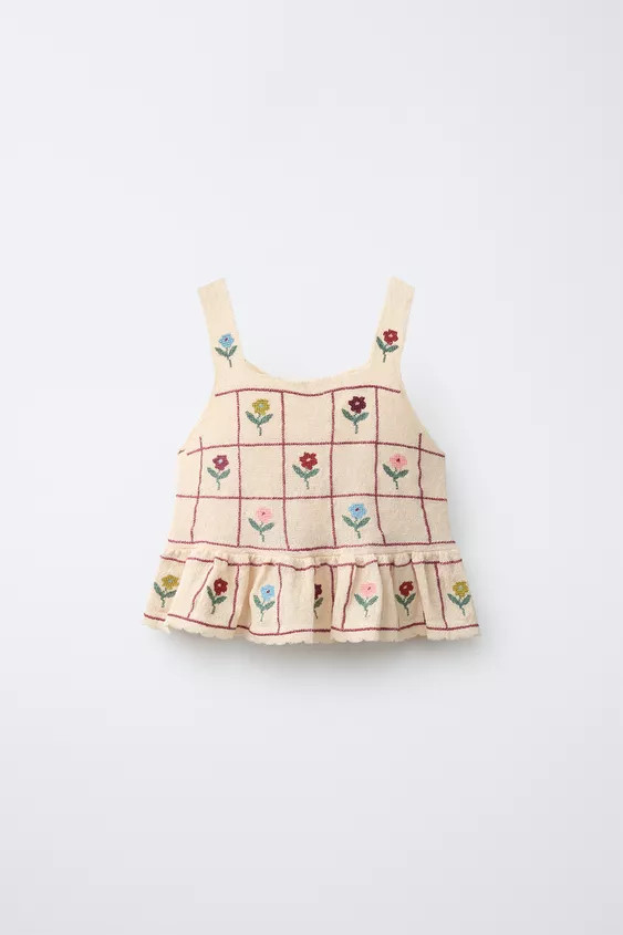 Round neck top with straps. Featuring a floral print and a ruffled hem. | Zara UK