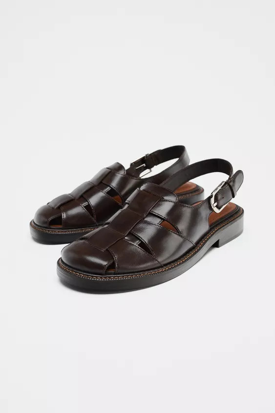 Leather slingback cage sandals. Adjustable metal buckle on the back strap. Topstitching detail on... | Zara UK