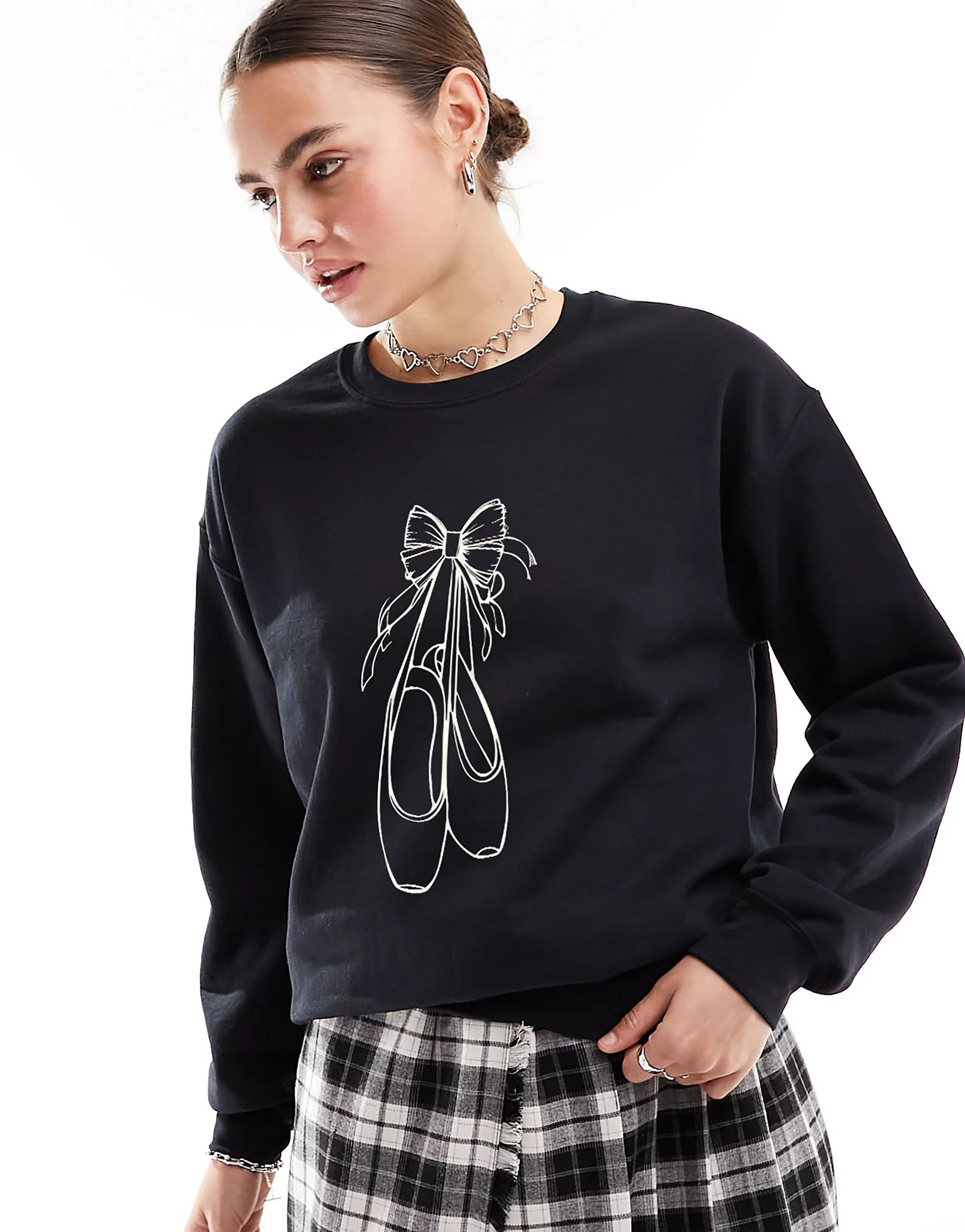 ASOS DESIGN oversized sweatshirt with bow graphic in black | ASOS (Global)