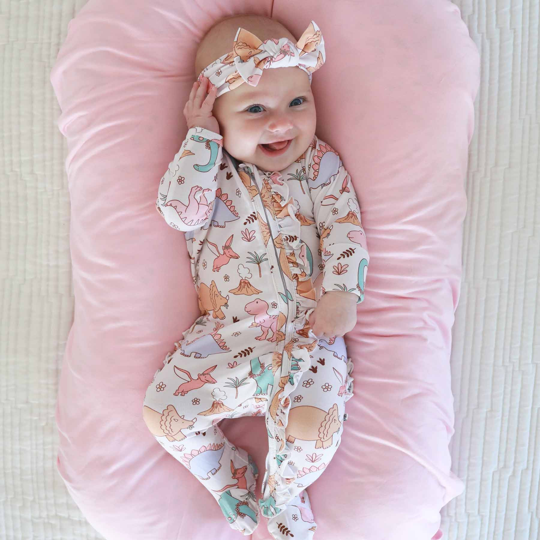 Dolly's Dinos Ruffle Zipper Footie | Caden Lane