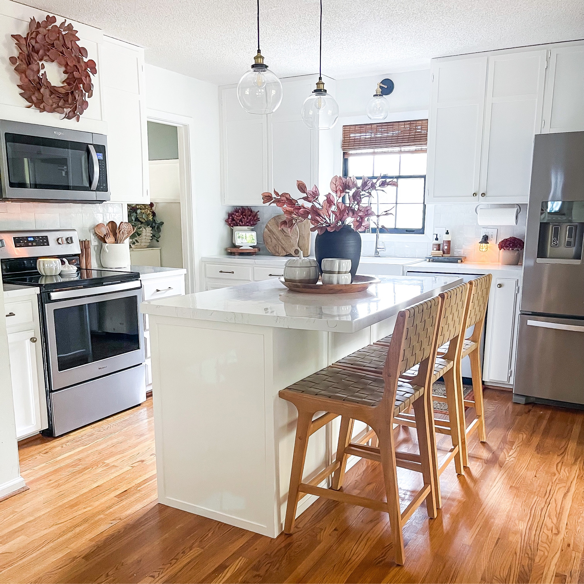 Kitchen views with simple fall touches.


Kitchen 
Kitchen decor 
Fall
Fall decor 
Barstools 
Kitchen island
Whit kitchen 

#LTKstyletip #LTKSeasonal #LTKhome