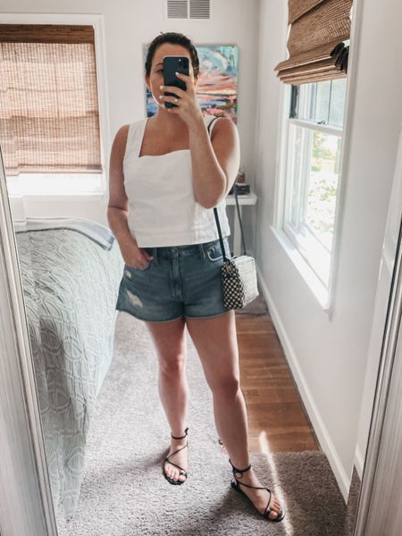 Simple summer outfit for a hot day.

White linen tank top
Madewell jean shorts
Tkees sandals
Clare V crossbody bag 

Outfit inspiration 
Outfit inspo
Concert outfit 
White outfit 
Summer outfit 
Casual outfit 
Everday outfit 

#LTKStyleTip #LTKItBag #LTKSeasonal