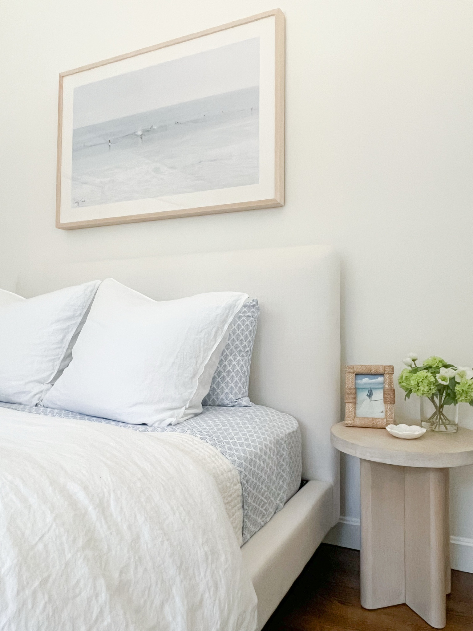 These little side tables (I have a 2nd on the other side of the bed) have been working out great in our guest room! A perfect size for this small space and I love the light wood color!

Quite a bit of my guest room bedding is also on sale right now! 
-
coastal home decor, coastal style, coastal nightstands, light wood nightstands, round side tables, small side tables, coastal bedroom furniture, beach house bedroom decor, beach house furniture, neutral bedroom, bedroom ideas, upholstered bed, queen size bed, pottery barn beds, platform beds, guest room decor, linen duvet cover, amazon duvet cover, white duvet cover, amazon down comforter, white linen pillow shams, duvet set, coastal artwork, artwork over bed, large artwork, beach artwork, ocean artwork, nightstand decor, side table decor, woven picture frames, amazon picture frames, marble ring dish, white quilts, pottery barn quilts, coastal bedding, white bedding

#LTKSaleAlert #LTKFindsUnder100 #LTKHome