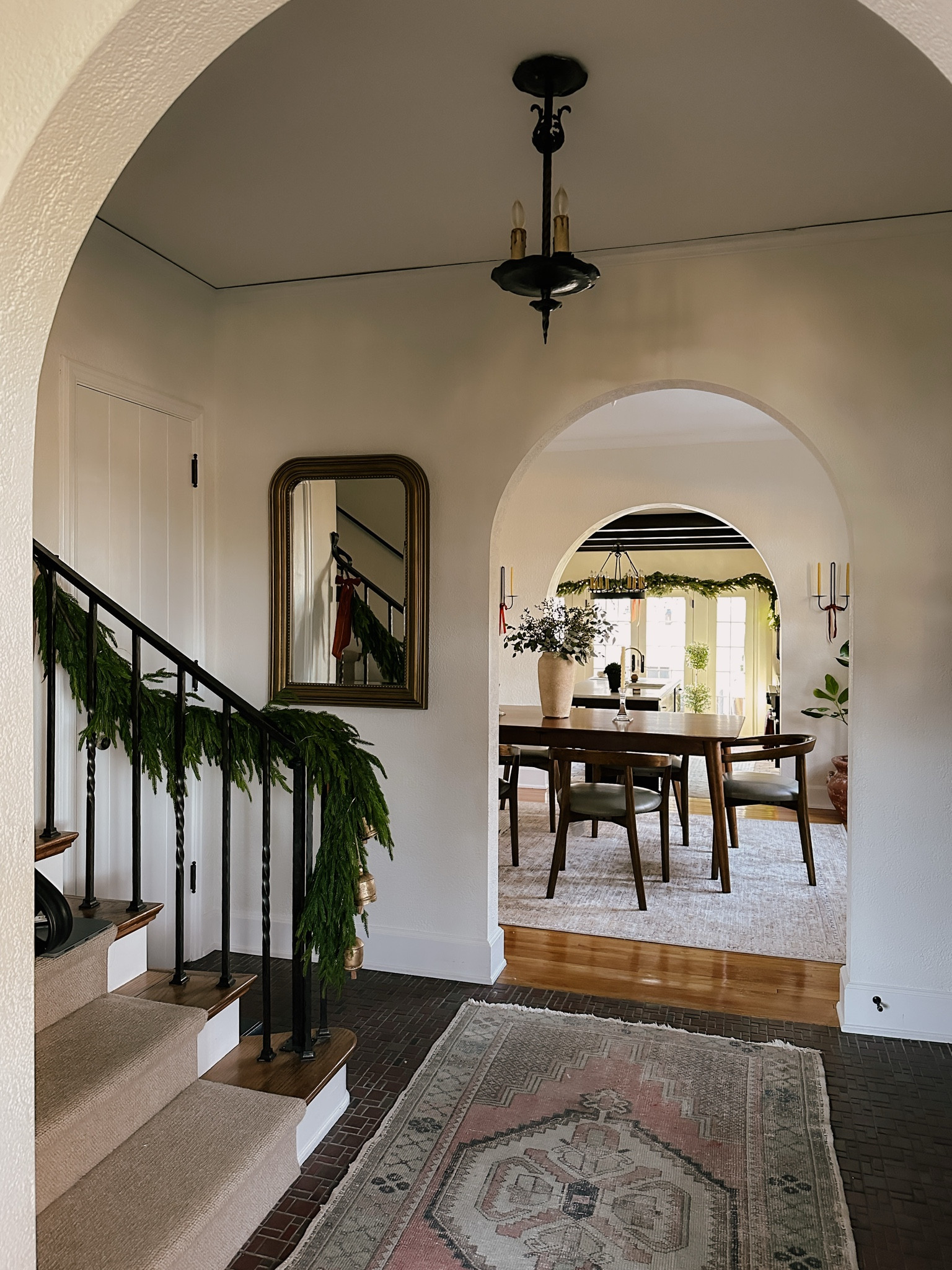 Christmas foyer from last year. Brass mirror (Antique Gold) is so beautiful and currently 25% off! | Christmas decor, holiday decoration, entryway 

#LTKHoliday #LTKStyleTip #LTKHome