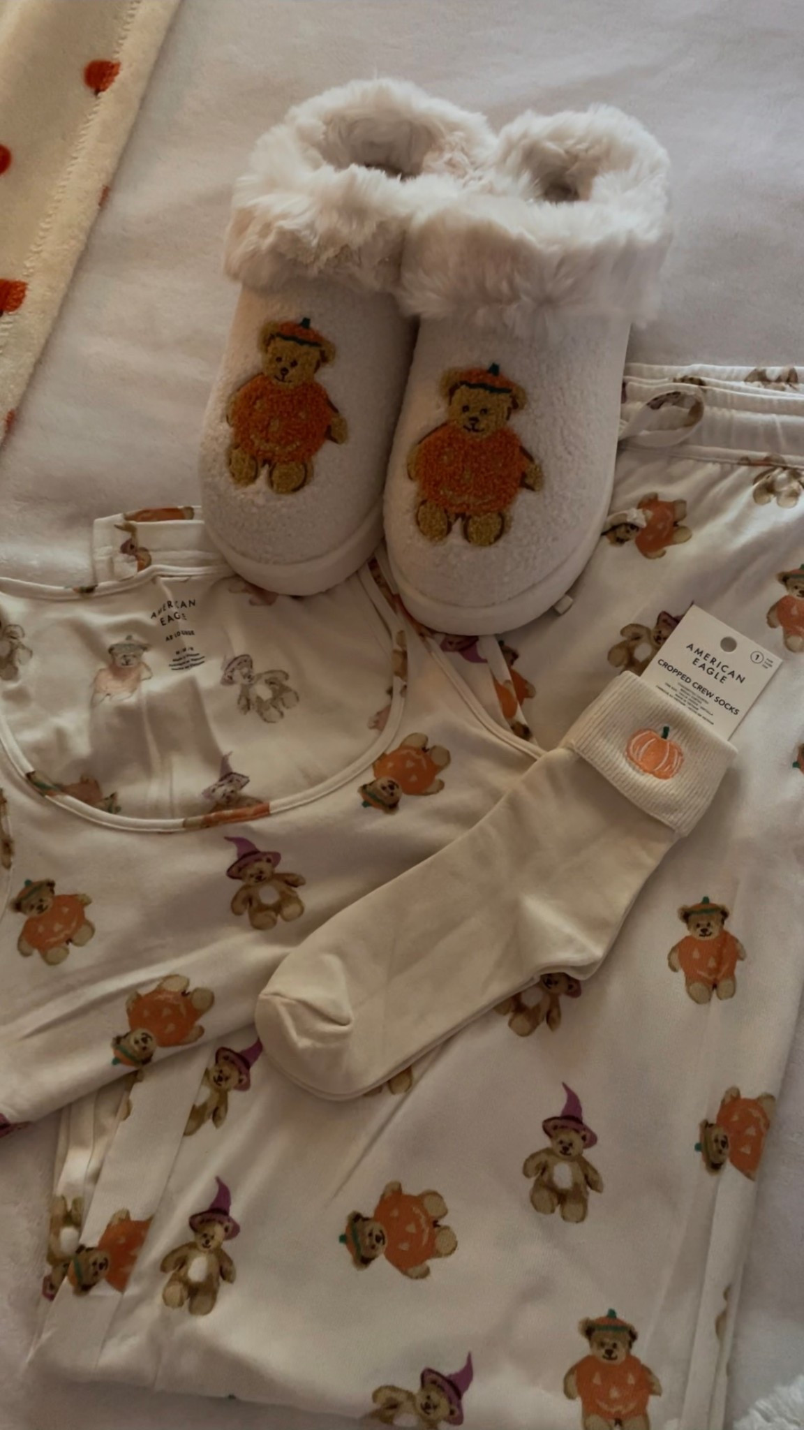Teddy bear pumpkin pajamas & slippers from American Eagle! These are the softest & coziest pjs I’ve ever worn! They do run big, I normally wear a size large and got a medium 🧸🎃 

#LTKSeasonal #LTKFindsUnder50 #LTKFamily