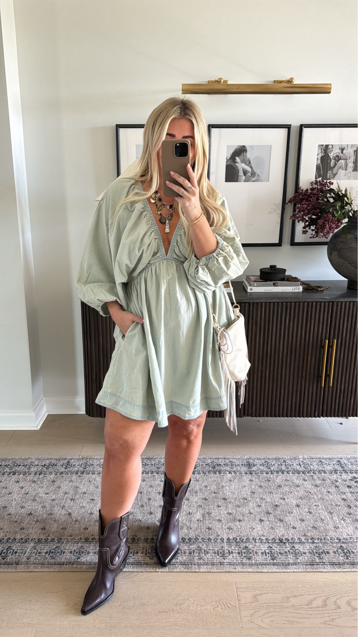 One of my free people closet staples year round! Love this light denim wash for fall🤍 I wear a medium in this dress but it runs big can probably do a small #dress #denim #freepeople 

#LTKStyleTip #LTKMidsize #LTKSeasonal