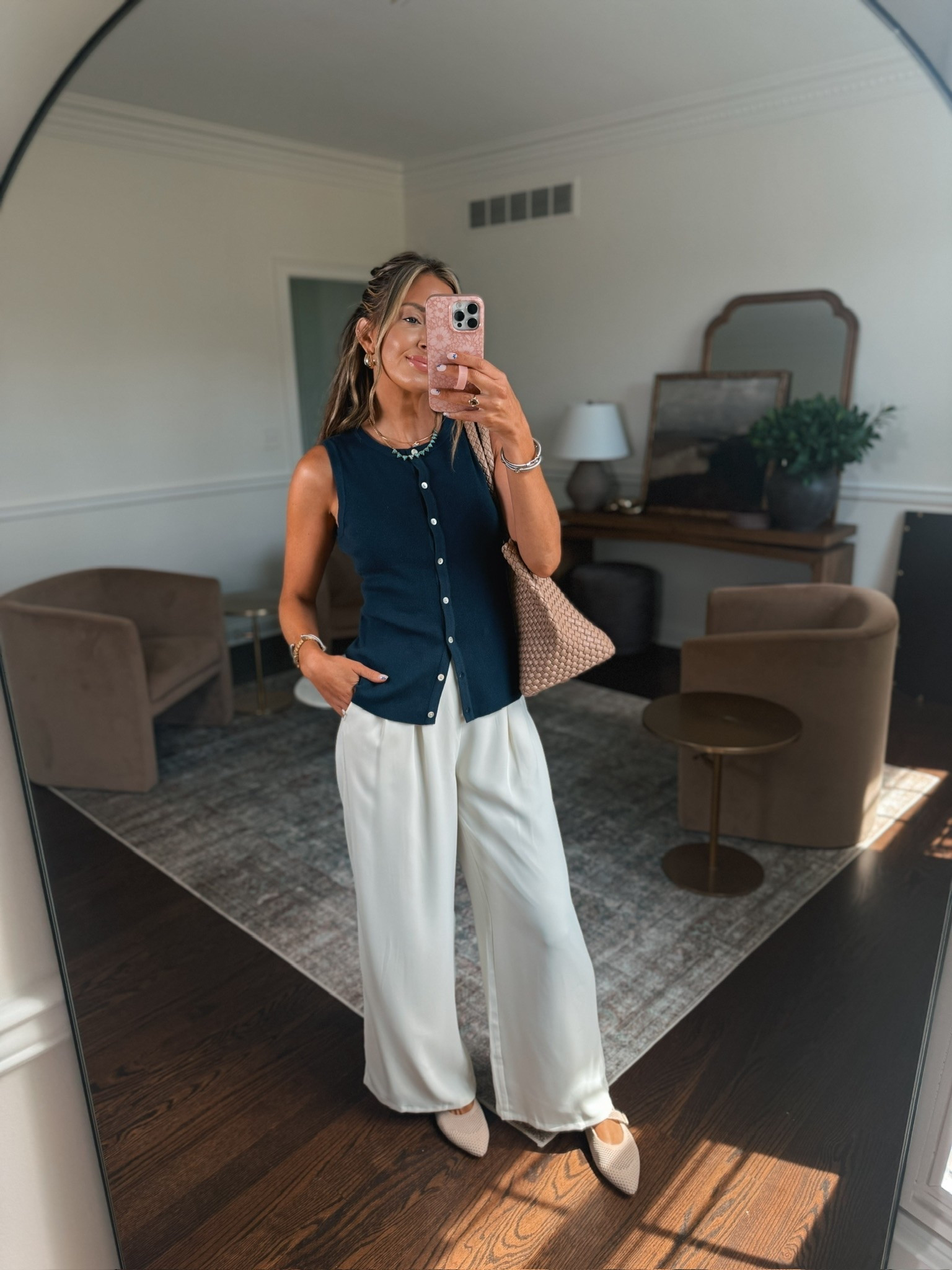 Summer office outfit idea! These pants are comfortable but look polished for work. And the button down sleeveless sweater is lightweight.

#LTKgrwm #LTKootd #LTKWorkwear