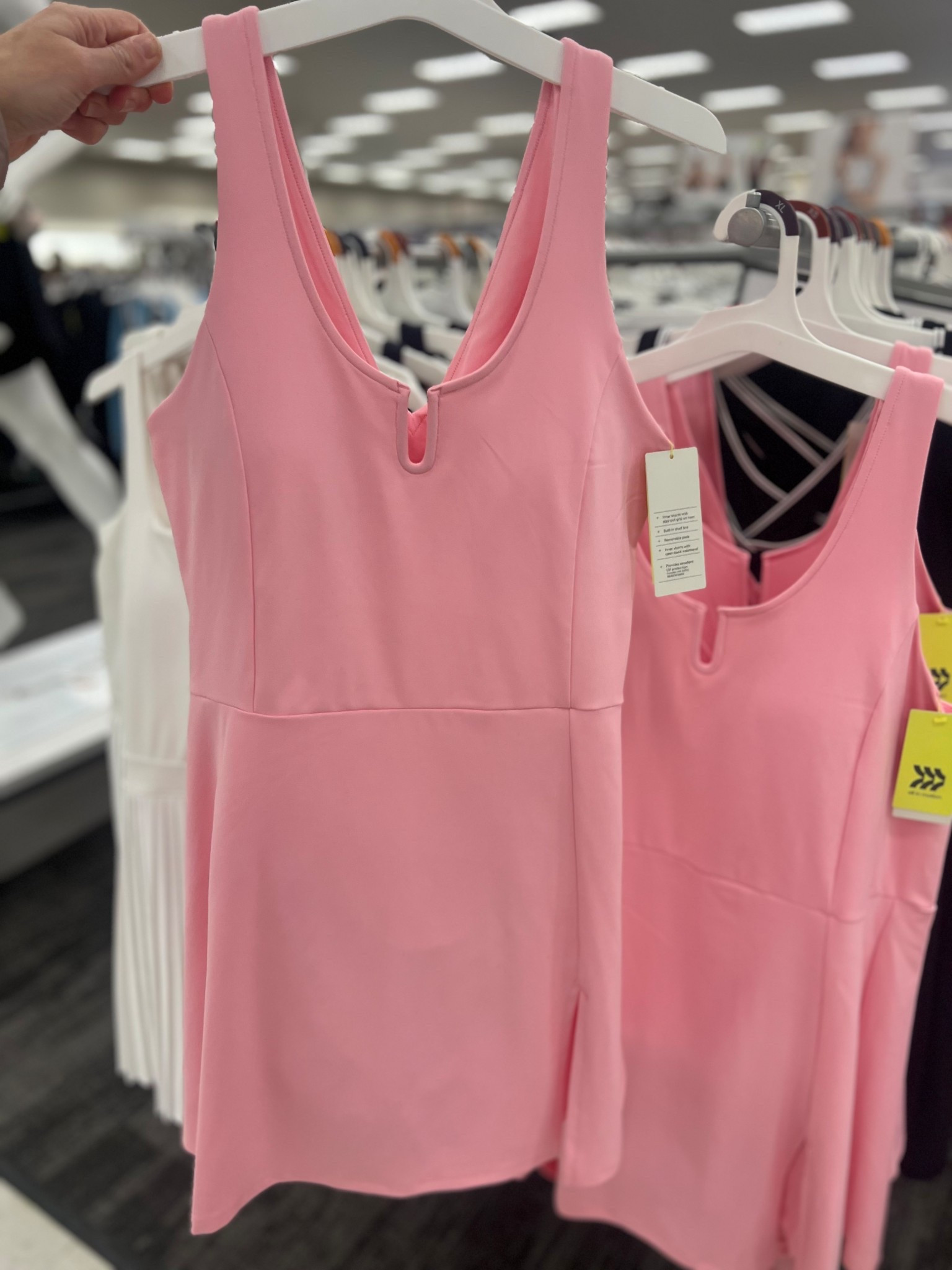 Target women’s spring pink slit all in motion athleisure 

Pickleball
Tennis dress 
Golf

Made for: organized sports, gym, outdoor activities, everyday wear
•	Moves with: midweight knit fabric blend of recycled polyester and spandex
•	Must-have features: UPF 50+ rating, moisture wicking, quick drying, sleeveless, round-neck front and V-neck back, notch front, front slit, built-in shelf bra, built-in shorts with inner stash pocket, mini length, pullover style, 24in inseam

#LTKSpringSale #LTKStyleTip #LTKFindsUnder50