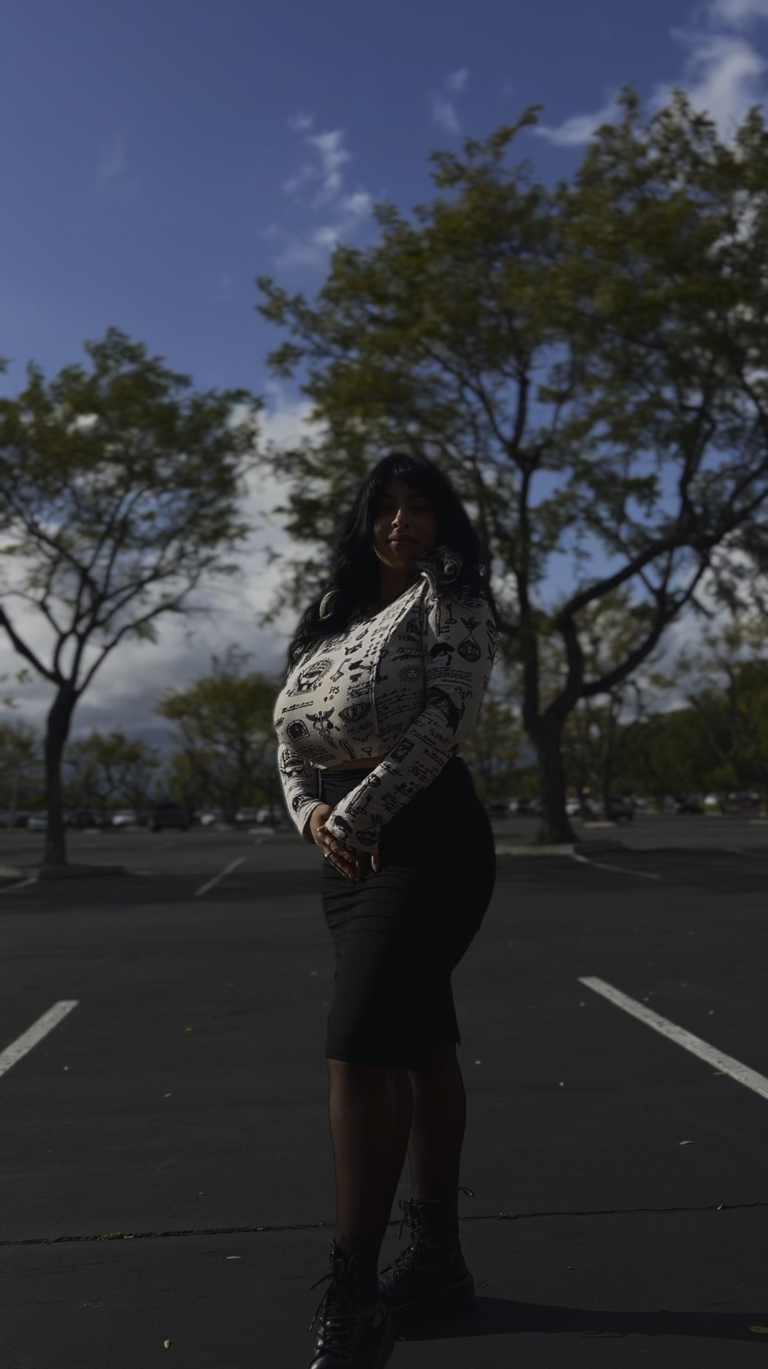 A work fit, a print top with a pencil skit and black tights and docs! 

#LTKVideo #LTKstyletip #LTKworkwear