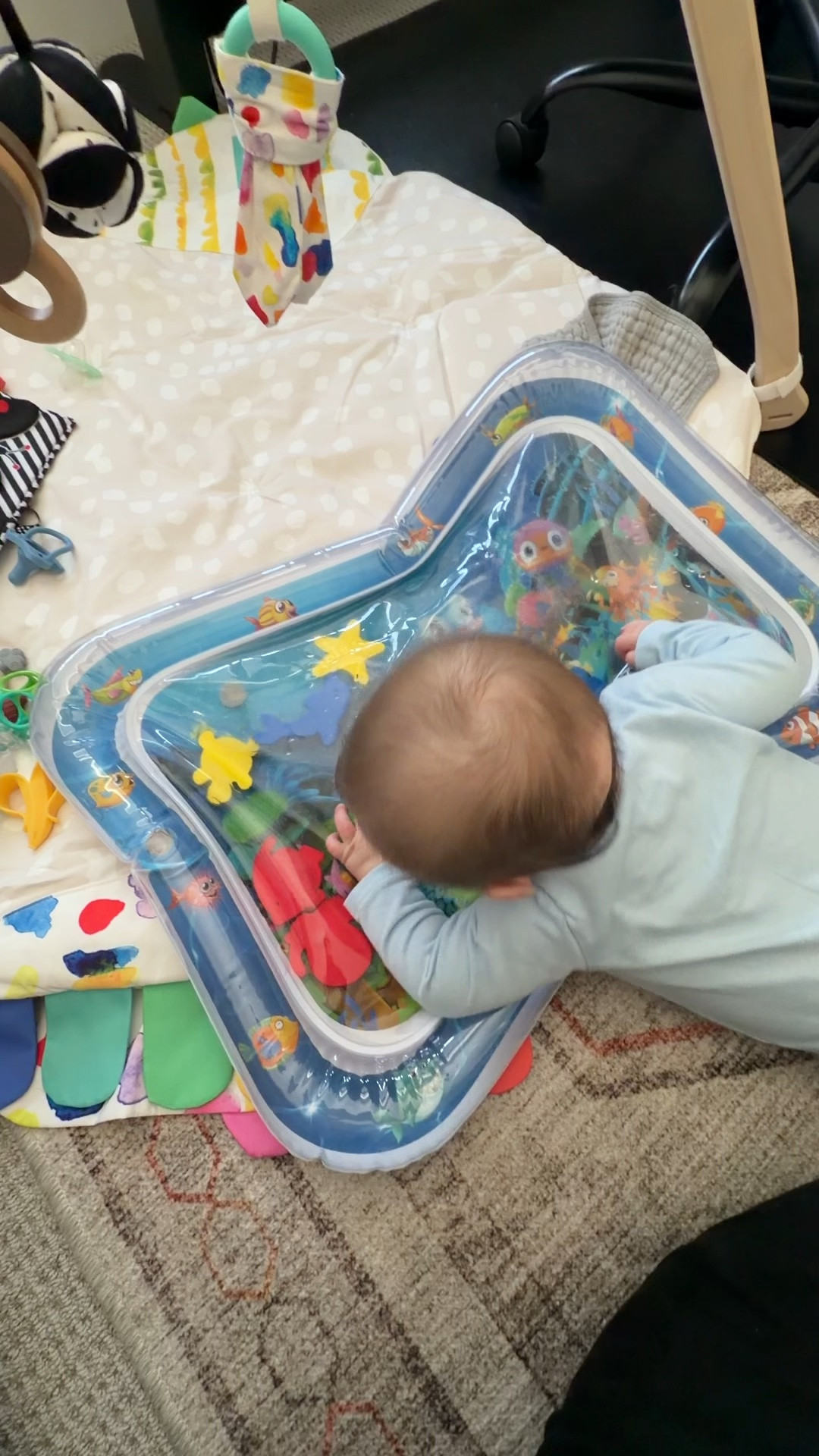 This has become way more fun now that Ollie’s actually at the stage where he wants to engage and play a little more. And if something is holding his attention long enough to get five full minutes of tummy time, I’m calling that a win.
—

fishy water play mat, baby water mat, tummy time mat, baby tummy time toy, sensory tummy time mat, baby sensory play mat, infant tummy time toy, tummy time essentials, baby play mat, baby water play mat, sensory baby toy, 5 month old baby toys, baby tummy time help, tummy time activity, baby products we use, infant playtime, baby development toy, first time mom baby finds, baby must haves, Amazon baby finds

#LTKmomlife #LTKBaby